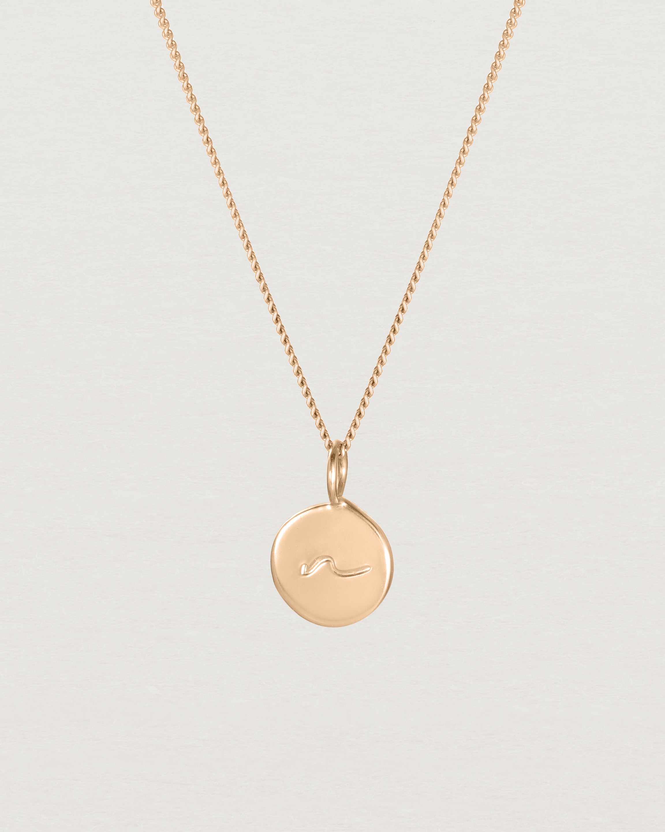Close up view of the Mae Necklace in rose gold.