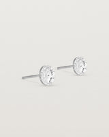 A pair of textured circular sterling silver studs