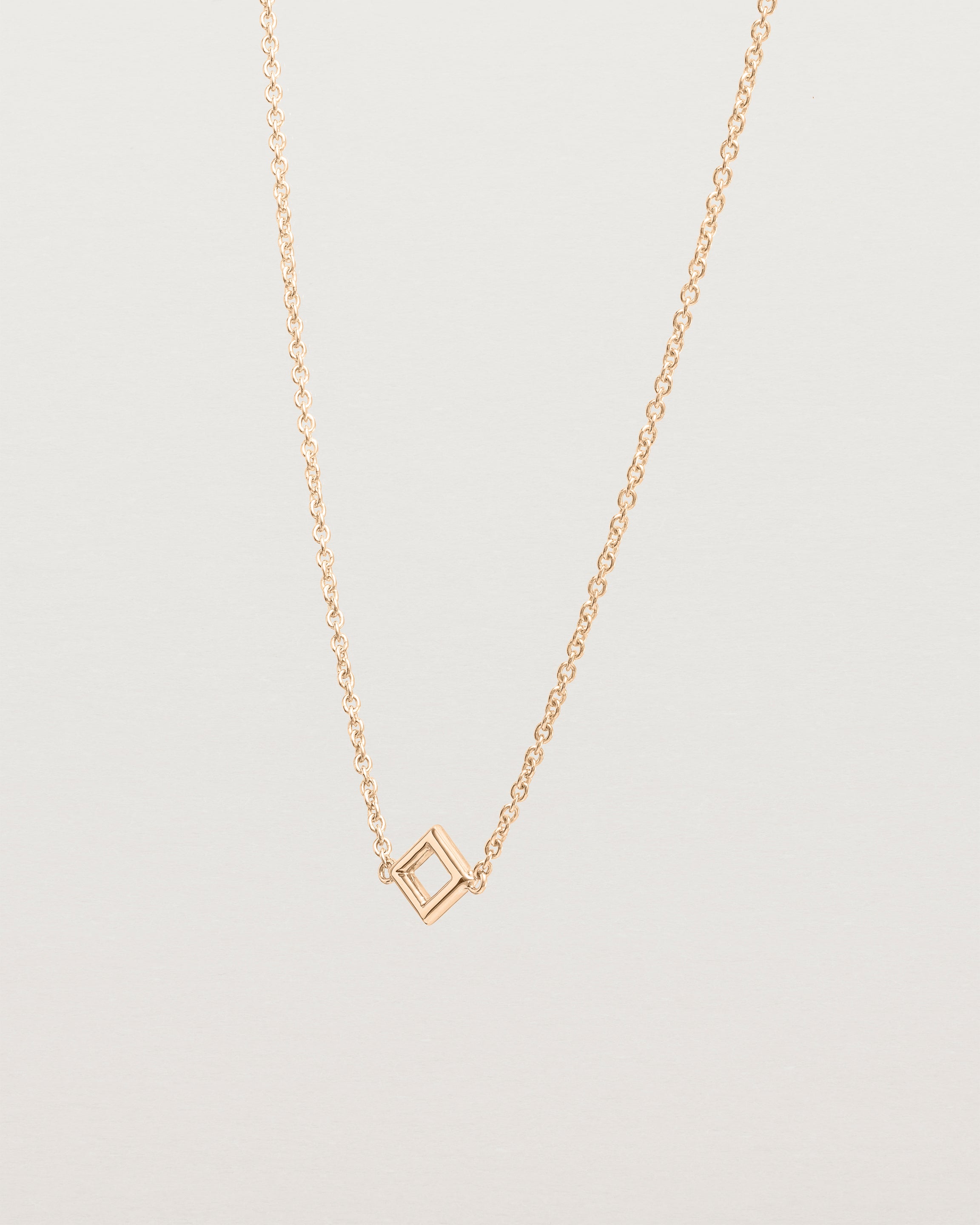 Angled view of the Nuna Necklace | Rose Gold.