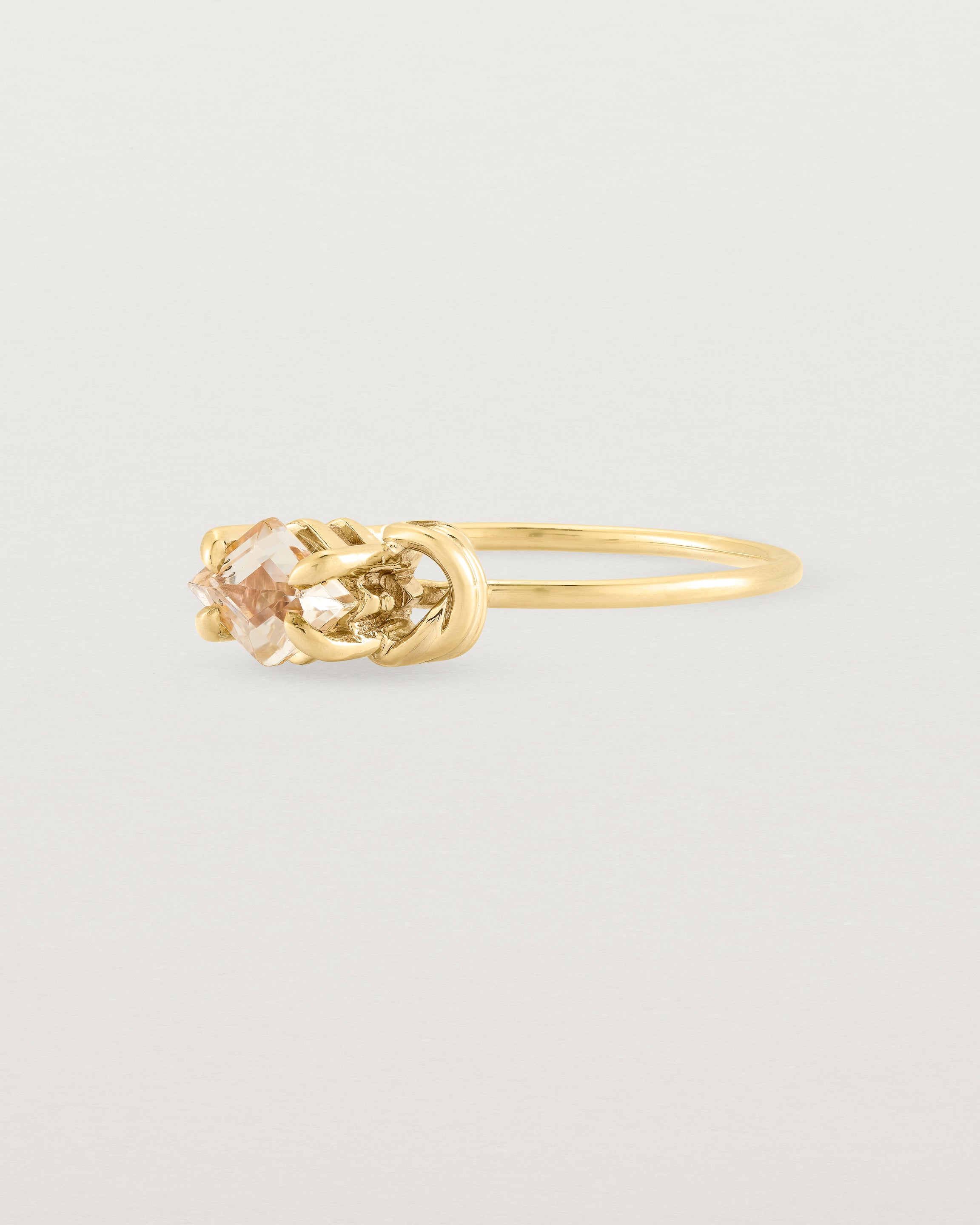 Angled view of the Nuna Ring | Savannah Sunstone in Yellow Gold.