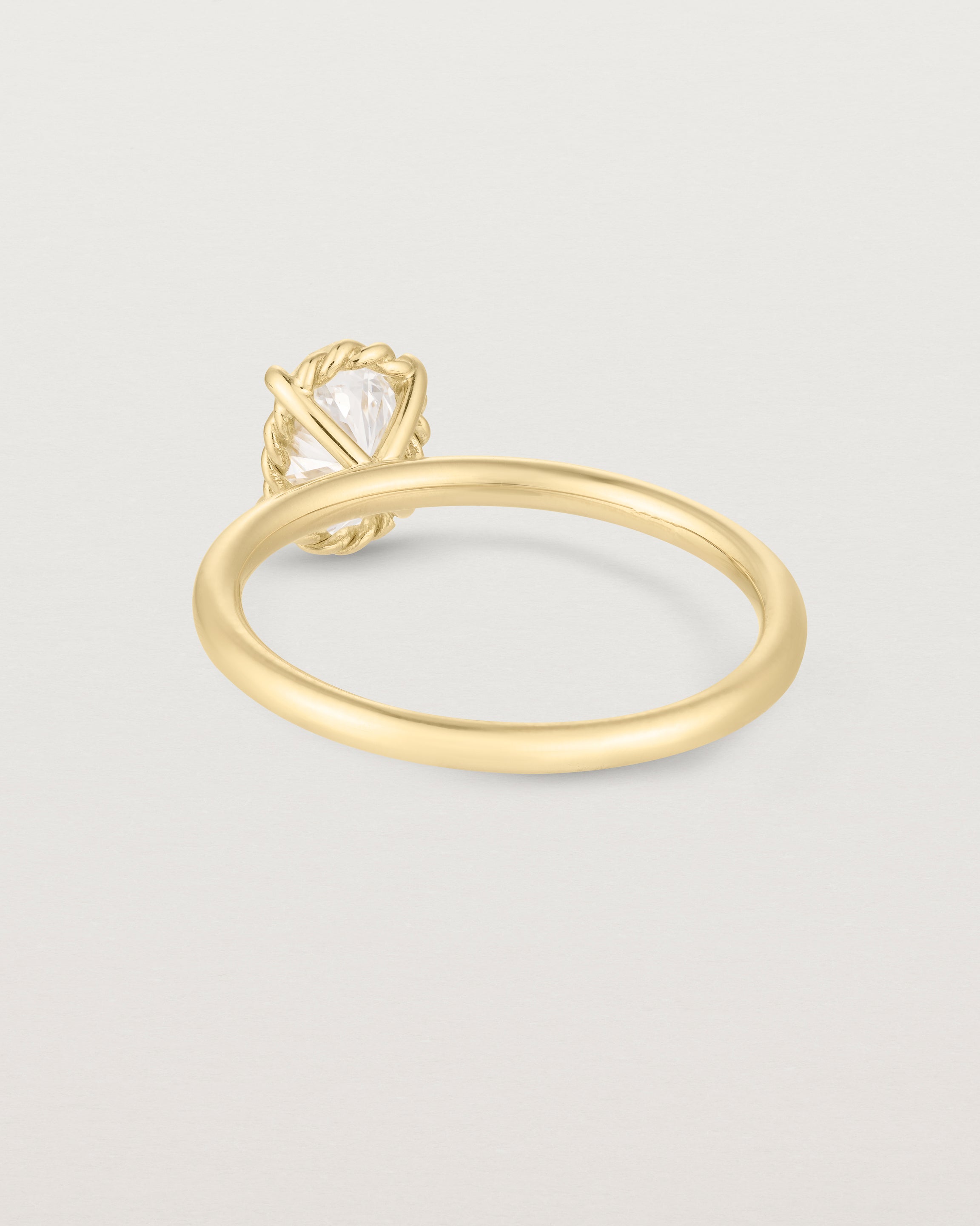Back image of yellow gold oval diamond solitaire