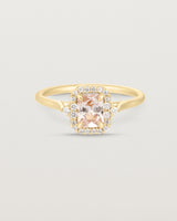 Front image of the winona ring with a peach sapphire in yellow gold.