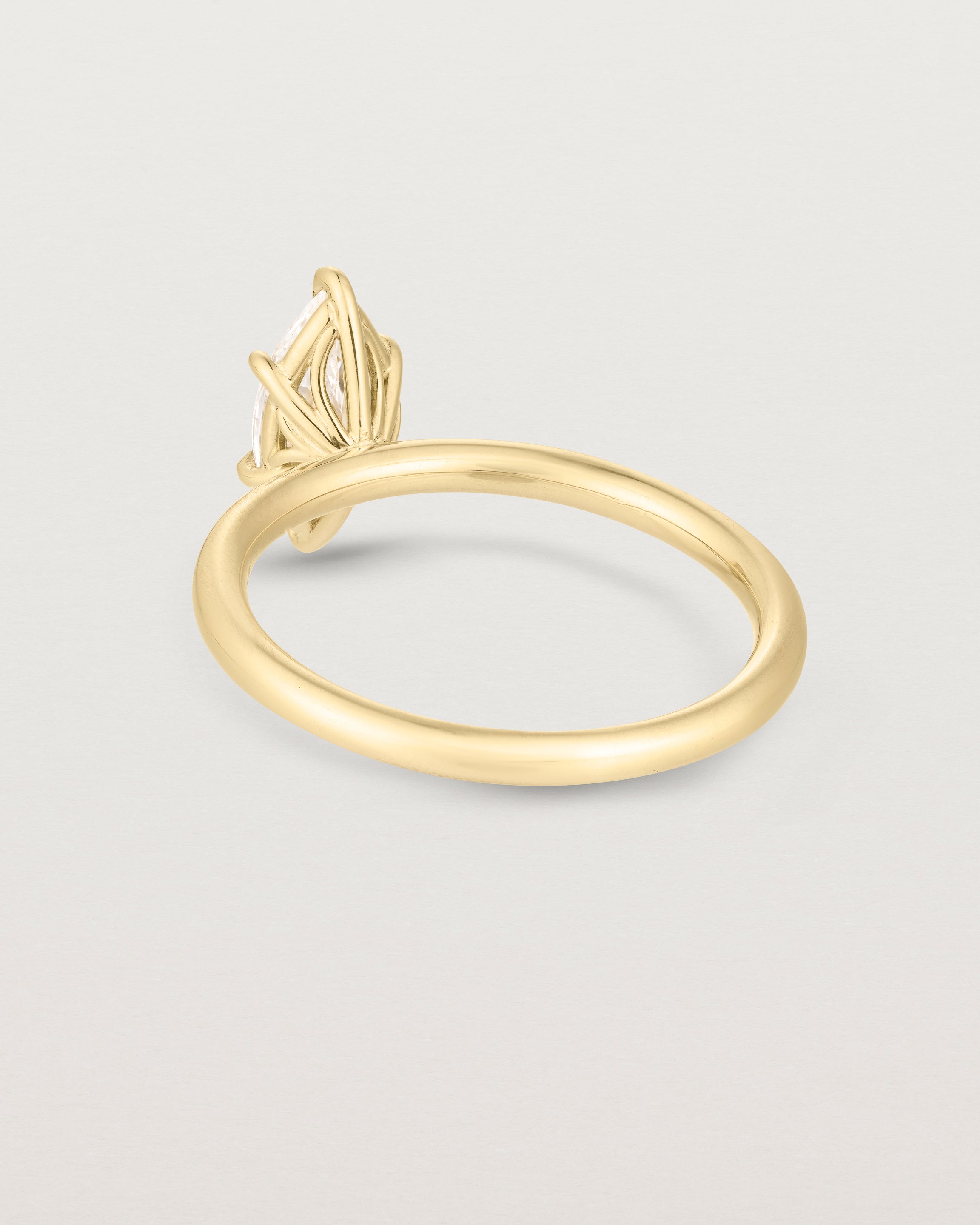 Back image of diamond marquise ring in yellow gold
