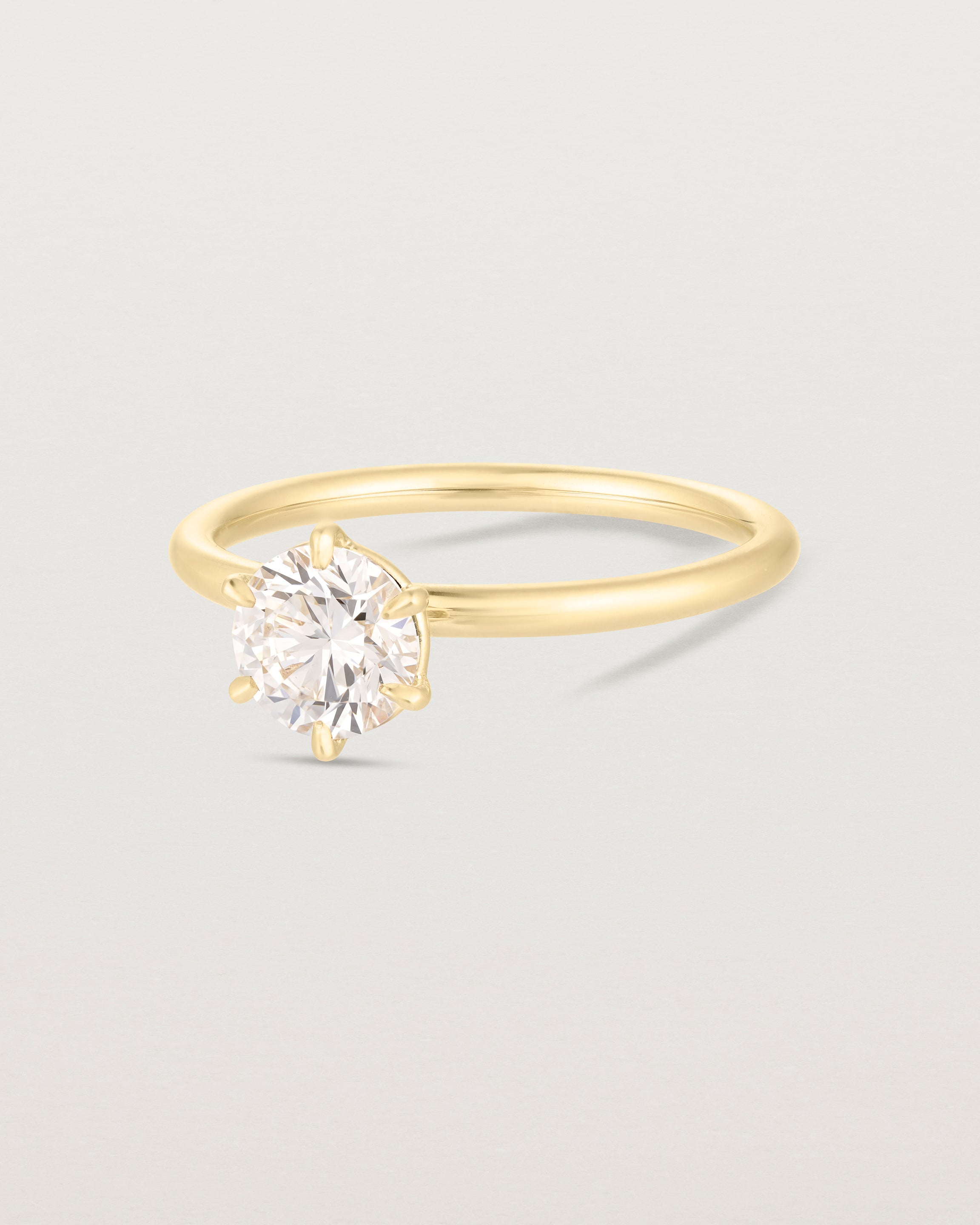 side image of round diamond signature solitaire
