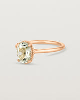 Angled view of the Thea Oval Solitaire | Green Amethyst in rose gold.