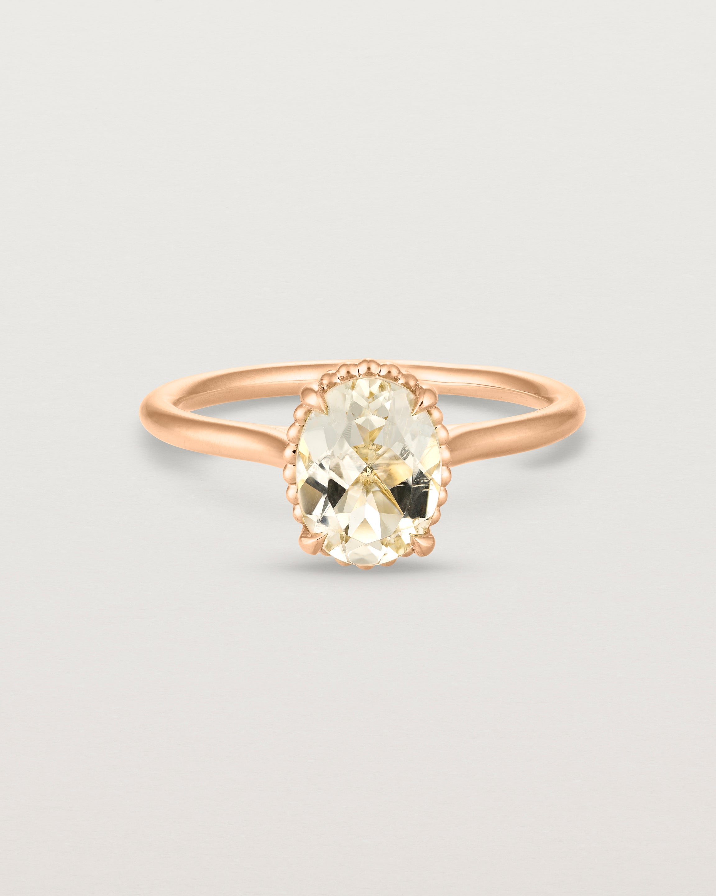 Front view of the Thea Oval Solitaire | Savannah Sunstone in rose gold.