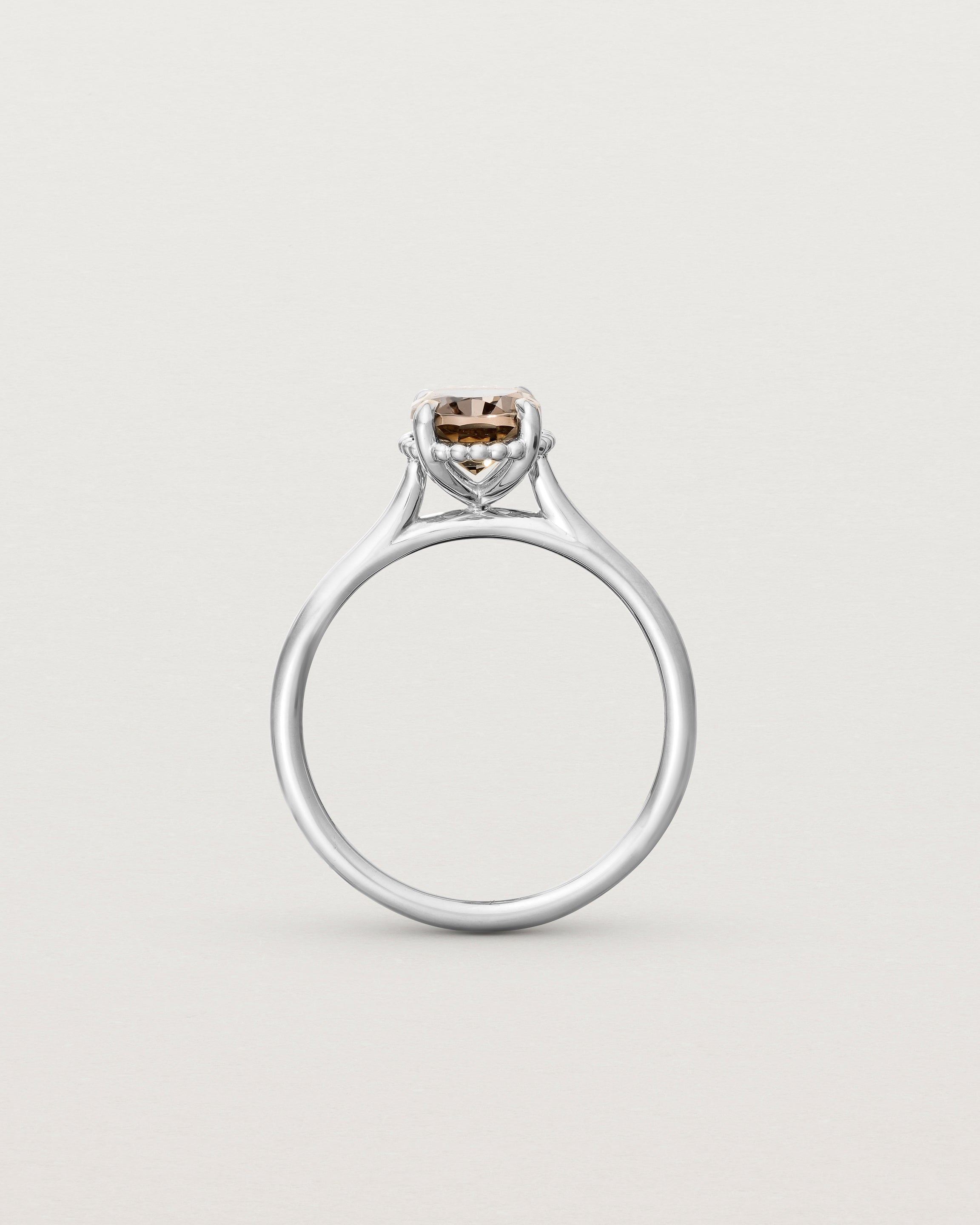 Standing view of the Thea Oval Solitaire | Smokey Quartz in white gold.