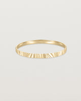 Front view of the Pan Bangle in yellow gold.