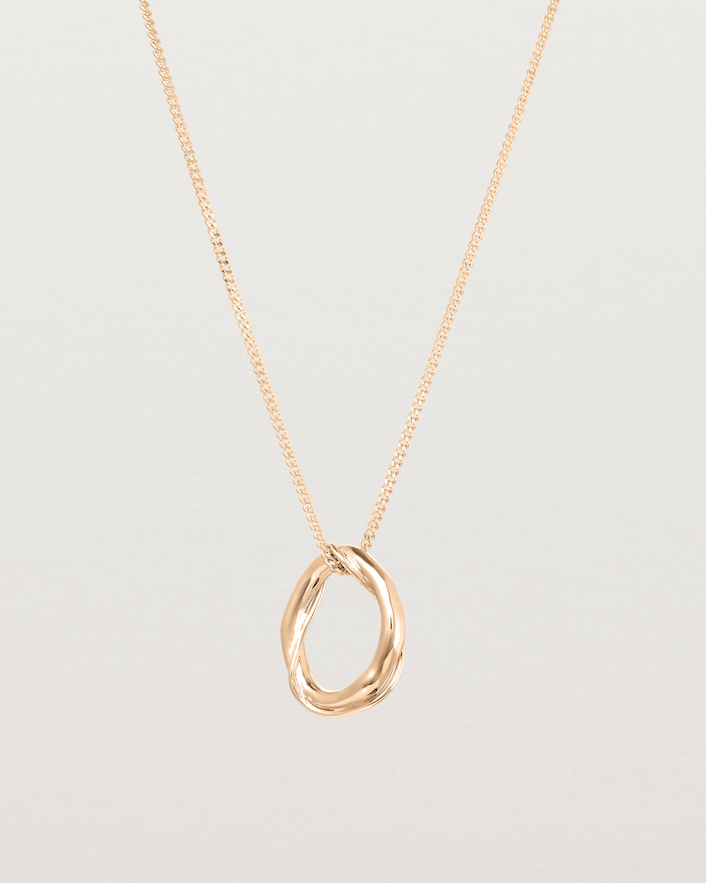 Front view of the Petite Dalí Necklace in rose gold.