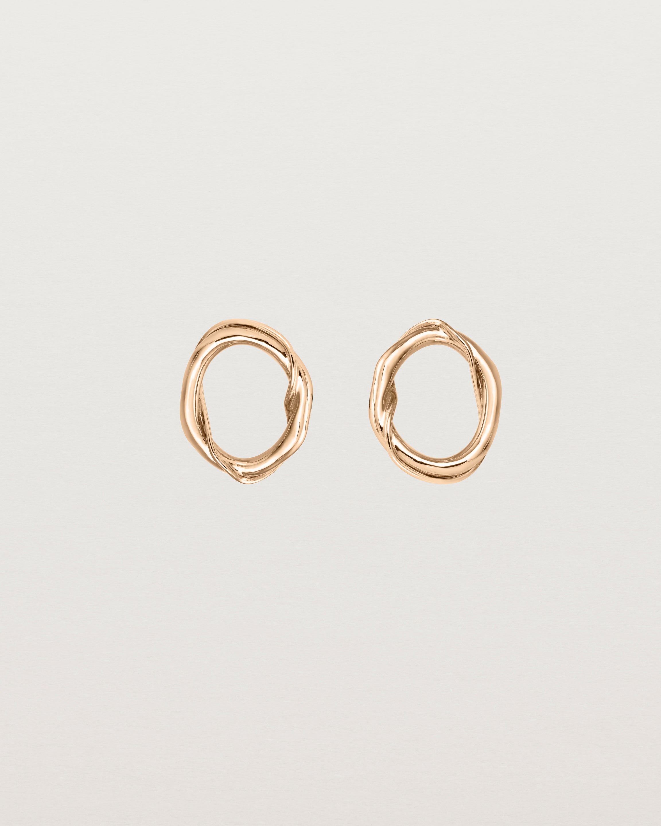 Front view of the Petite Dalí Earrings in rose gold.