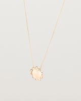 Angled view of the Petite Dotted Mana Necklace | Rose Gold