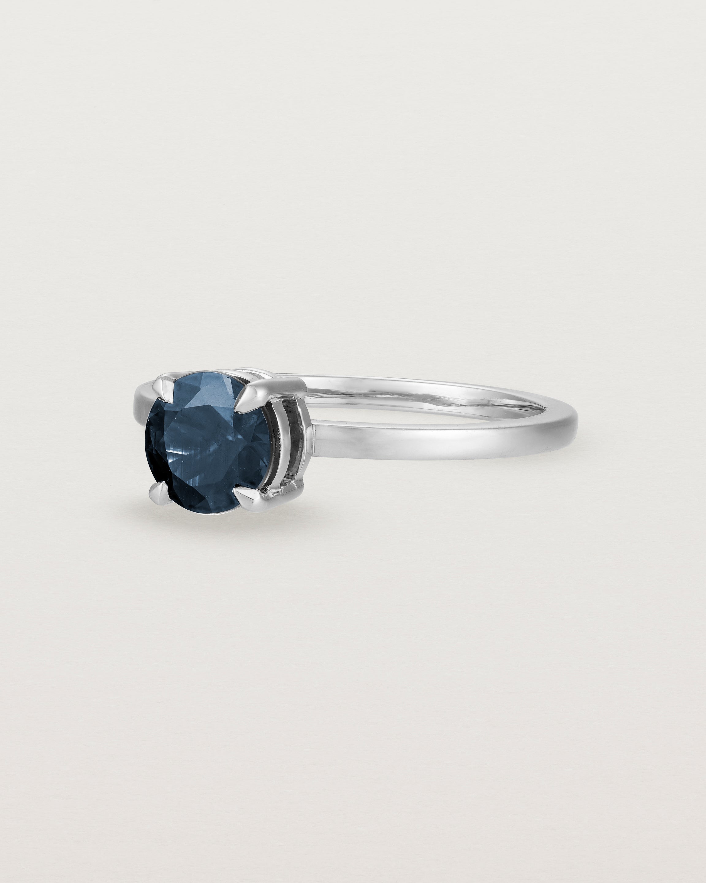 Angled view of the Petite Una Round Solitaire | Australian Sapphire | White Gold.