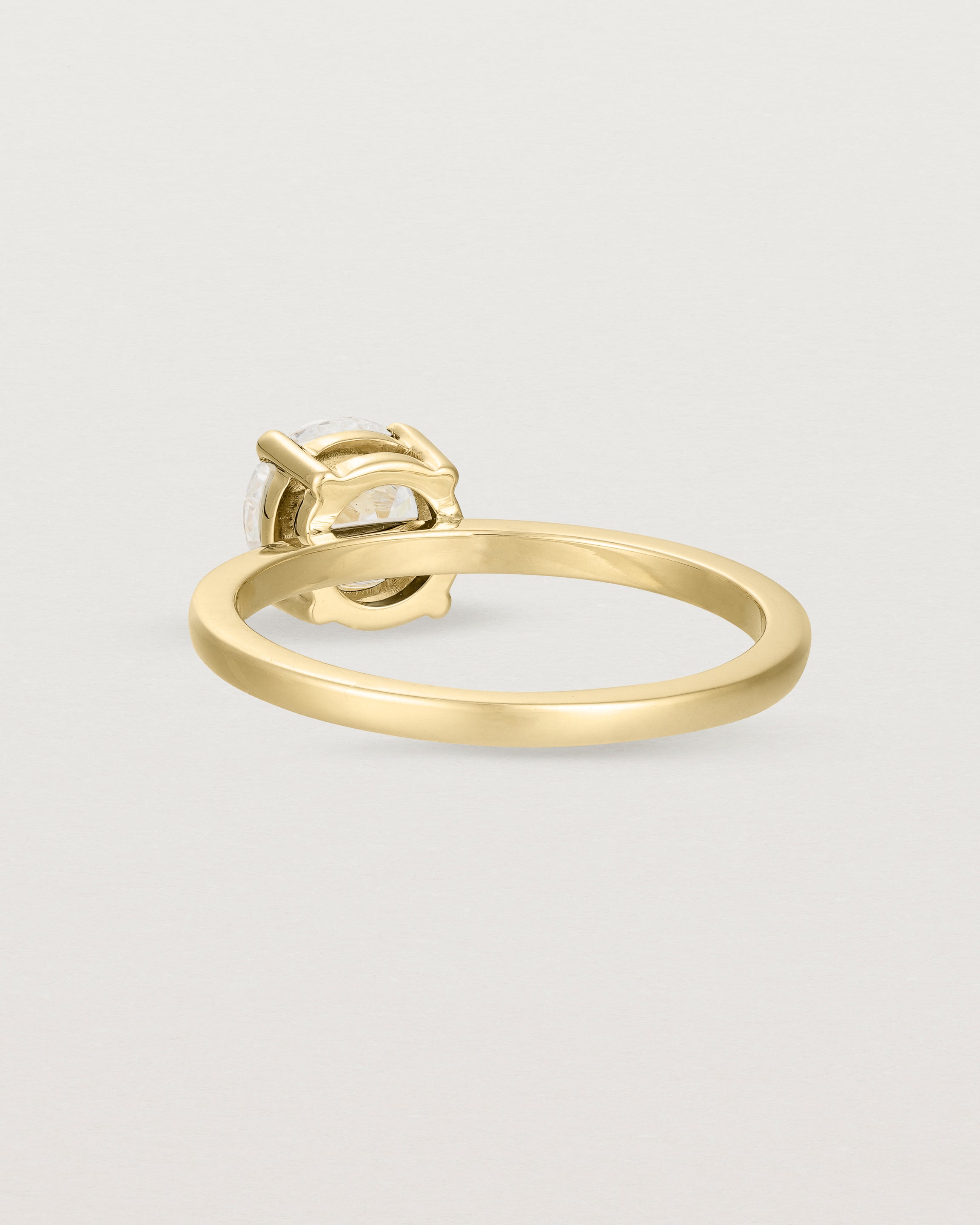 Back view of the Petite Una Round Solitaire | Laboratory Grown Diamond | Yellow Gold.