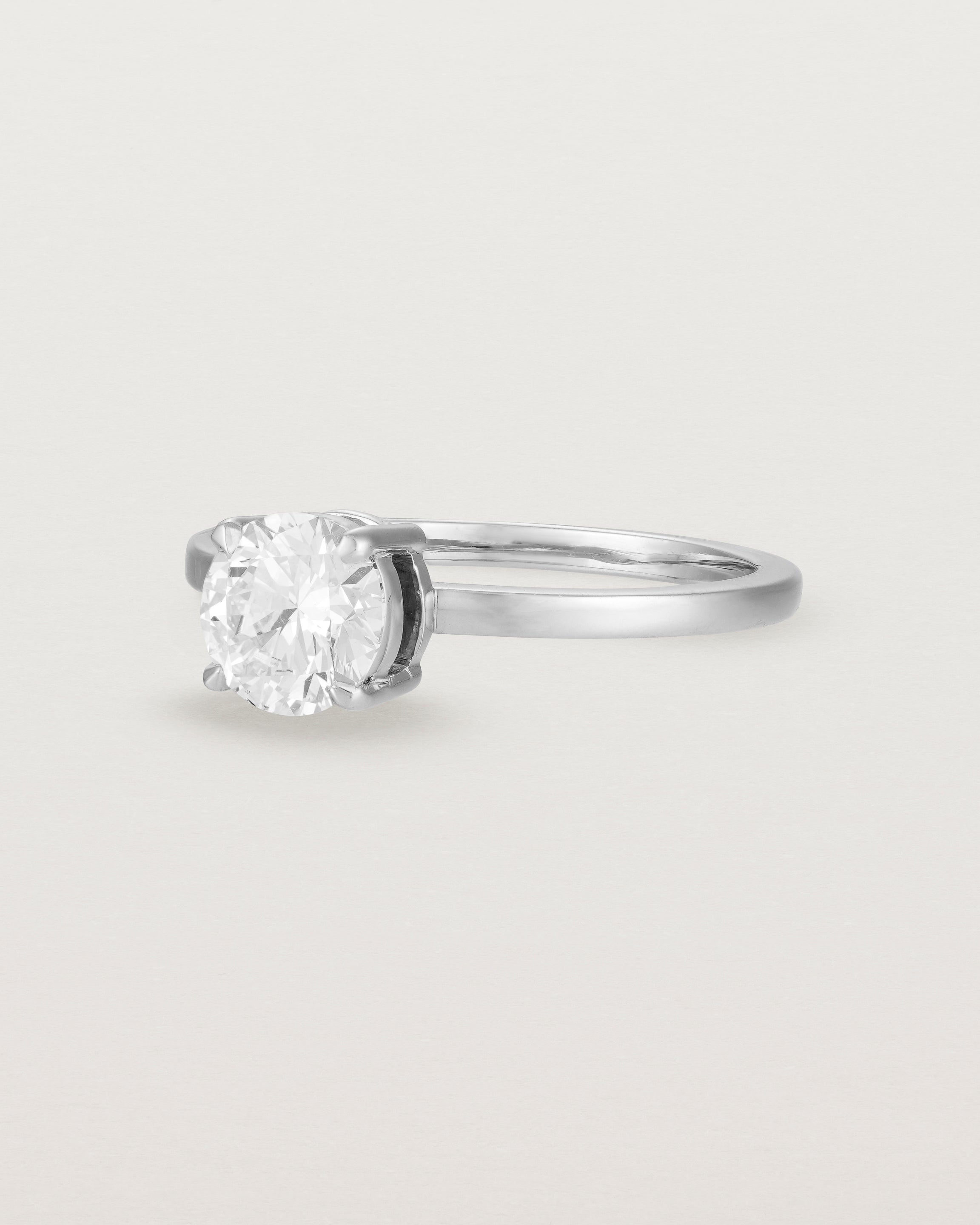 Angled view of the Petite Una Round Solitaire | Laboratory Grown Diamond | White Gold.