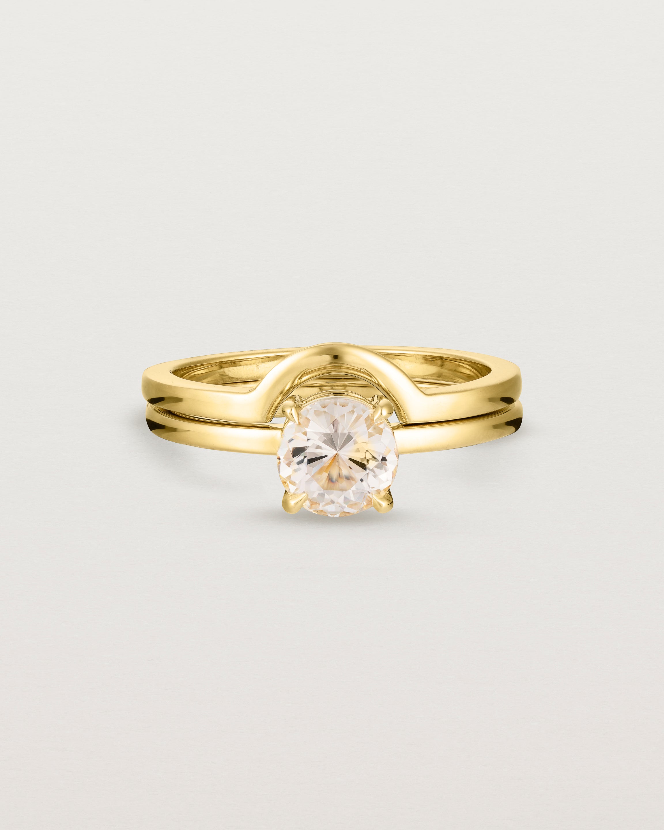 Front view of the Petite Una Round Solitaire | Morganite | Yellow Gold with the Cecile Crown Ring. 