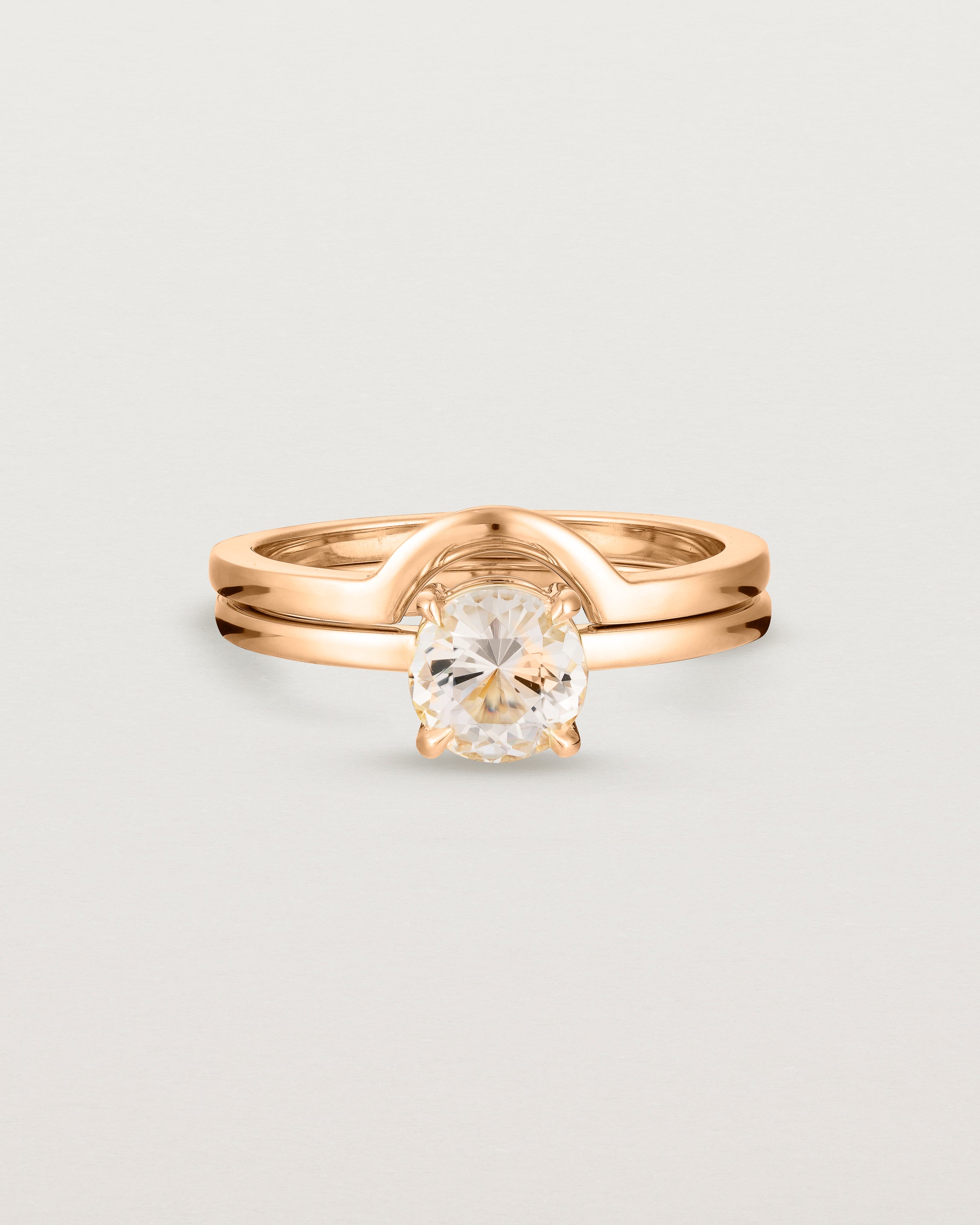 Front view of the Petite Una Round Solitaire | Morganite | Rose Gold stacking with the Cecile Crown Ring. 