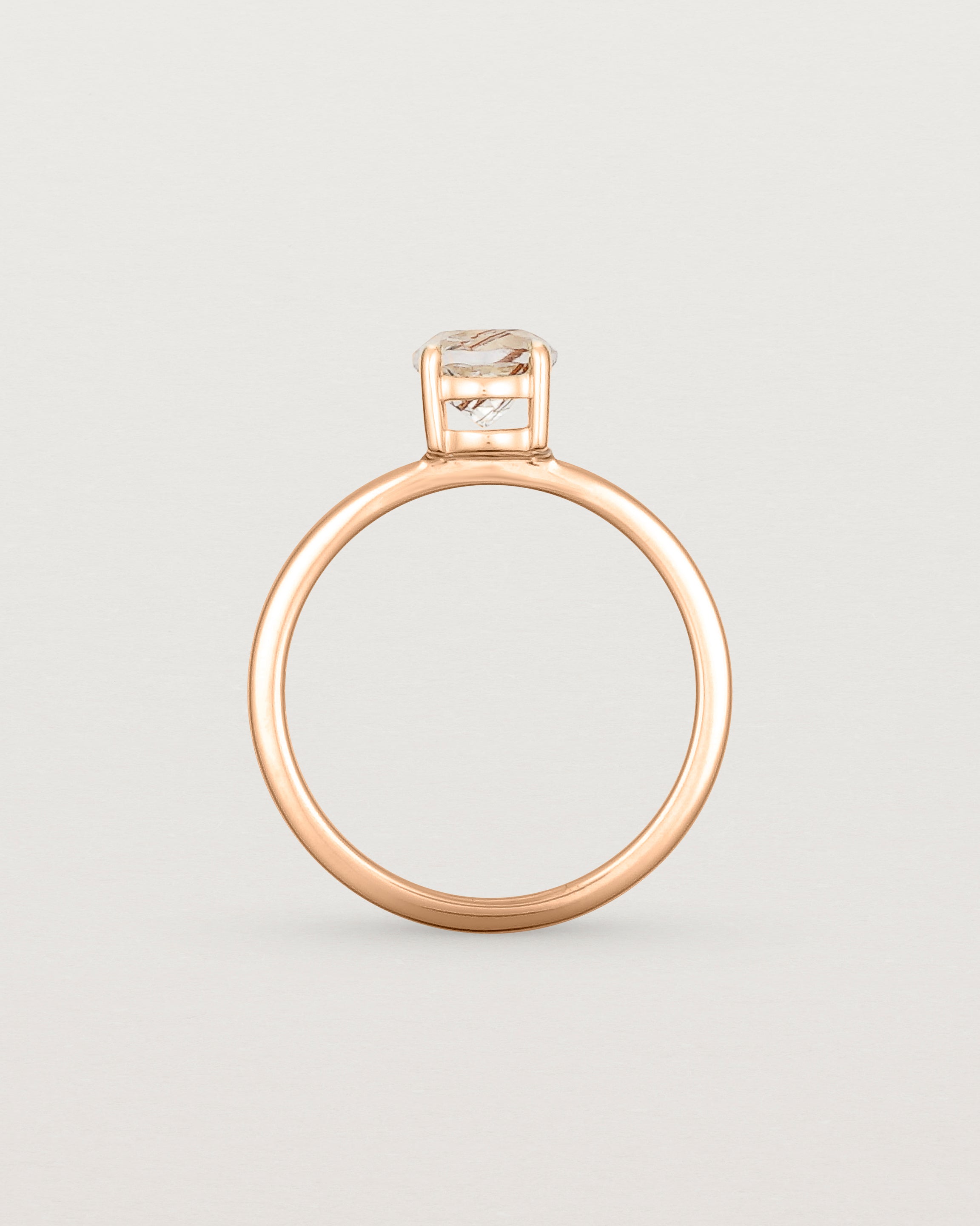 Standing view of the Petite Una Round Solitaire | Rutilated Quartz | Rose Gold.