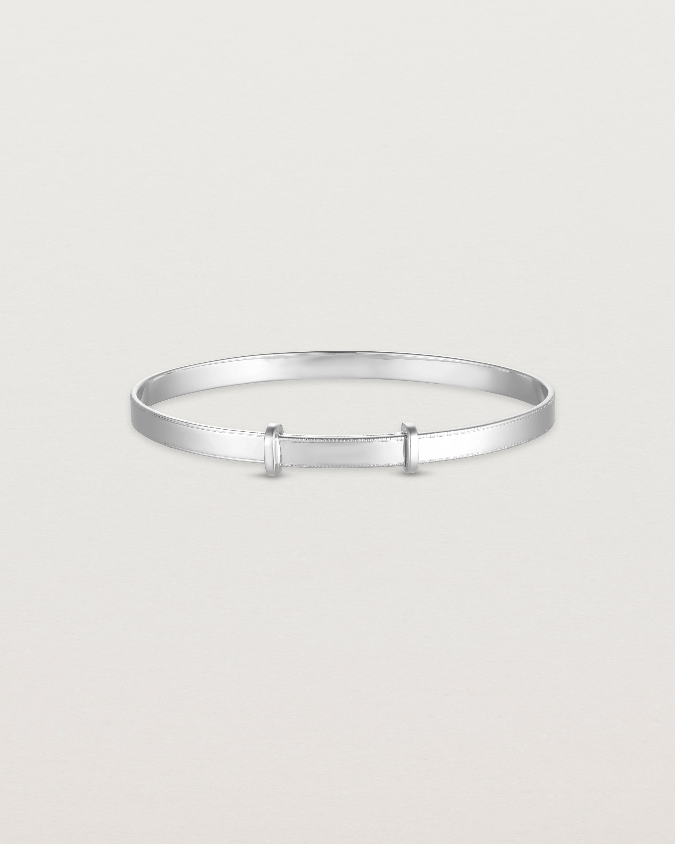 back image of the Toujours Bangle with millgrain in Sterling Silver
