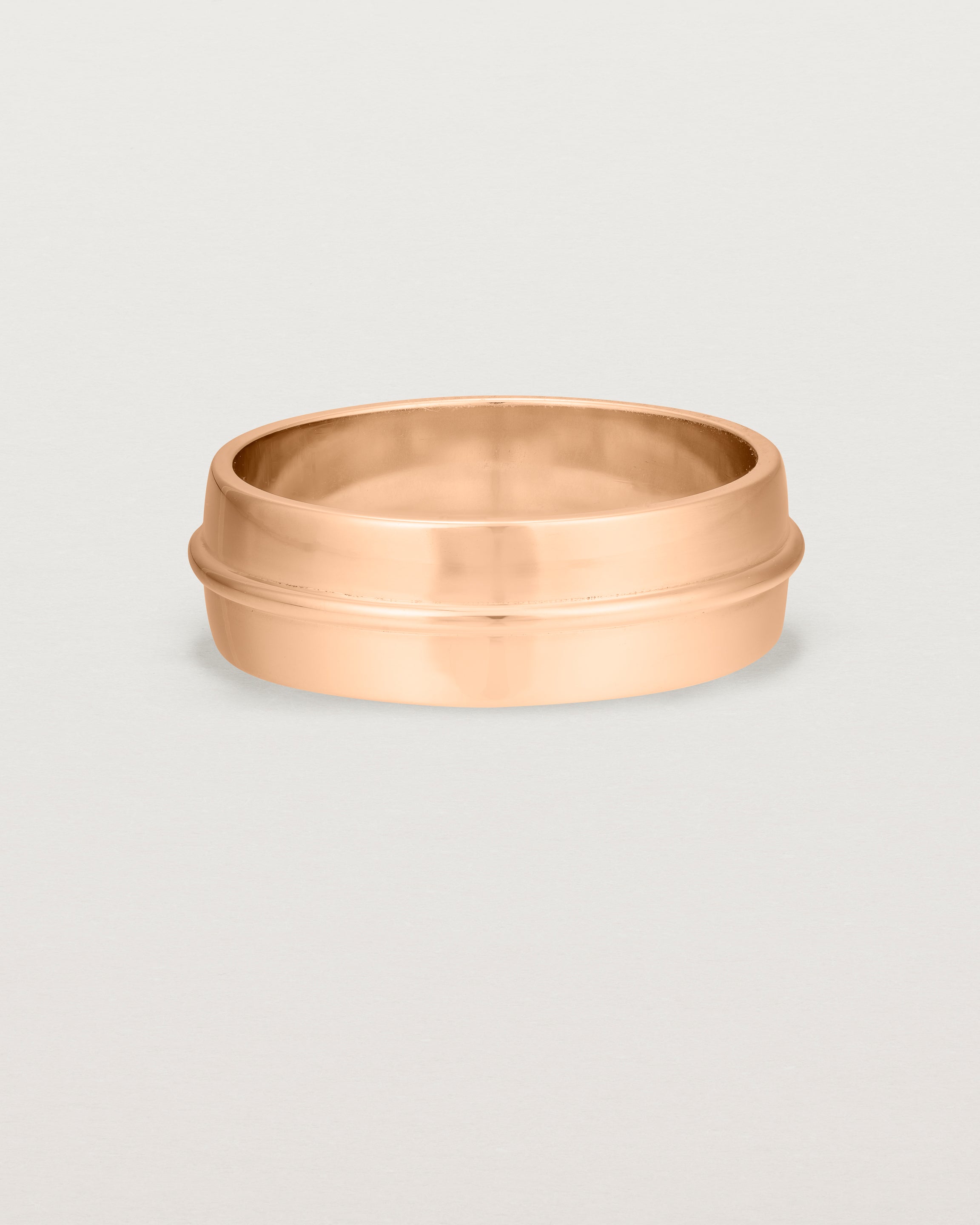 Front view of the Seam Wedding Ring | 7mm | Rose Gold.