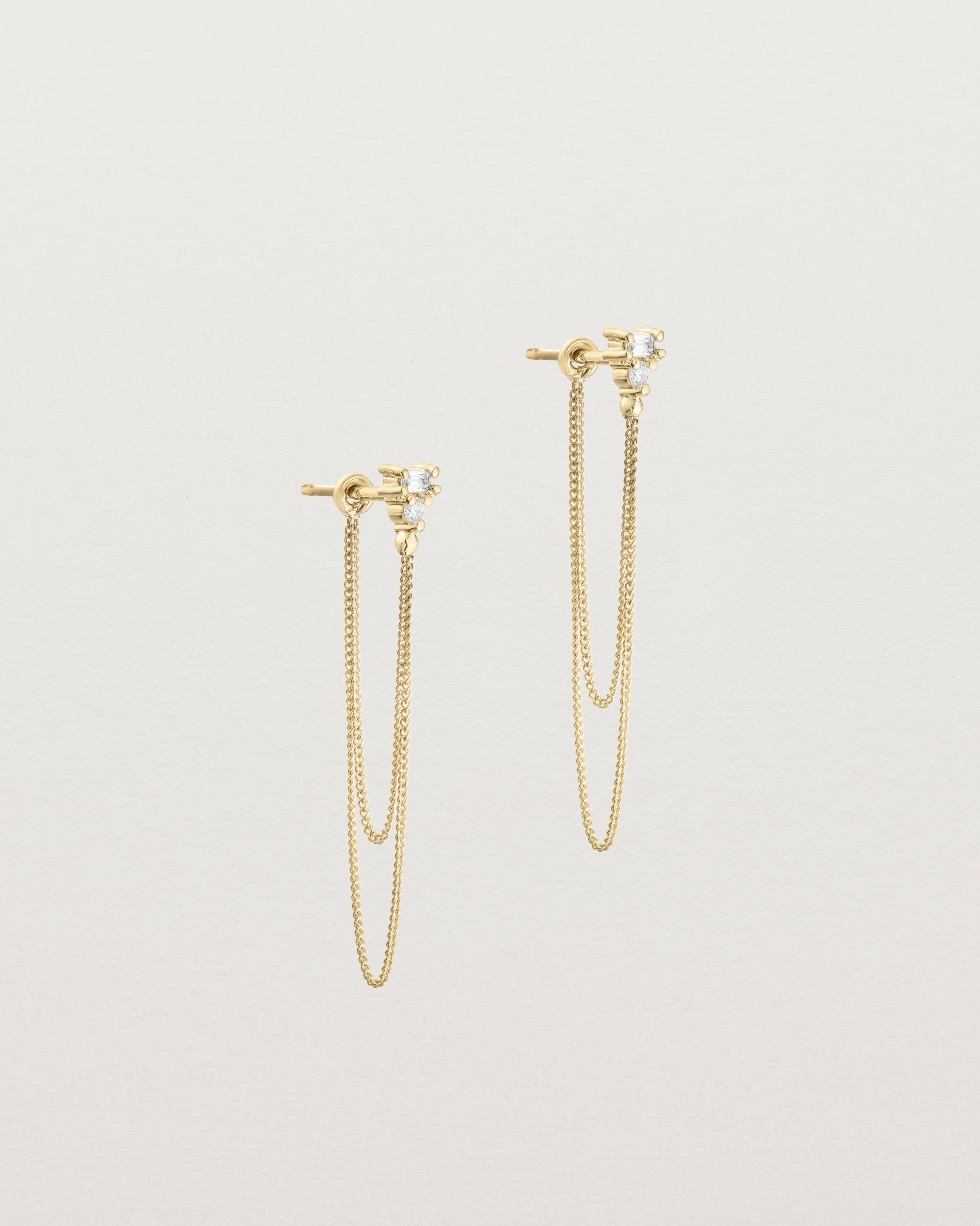 A pair of Sena Loop Studs | Diamonds | Yellow Gold