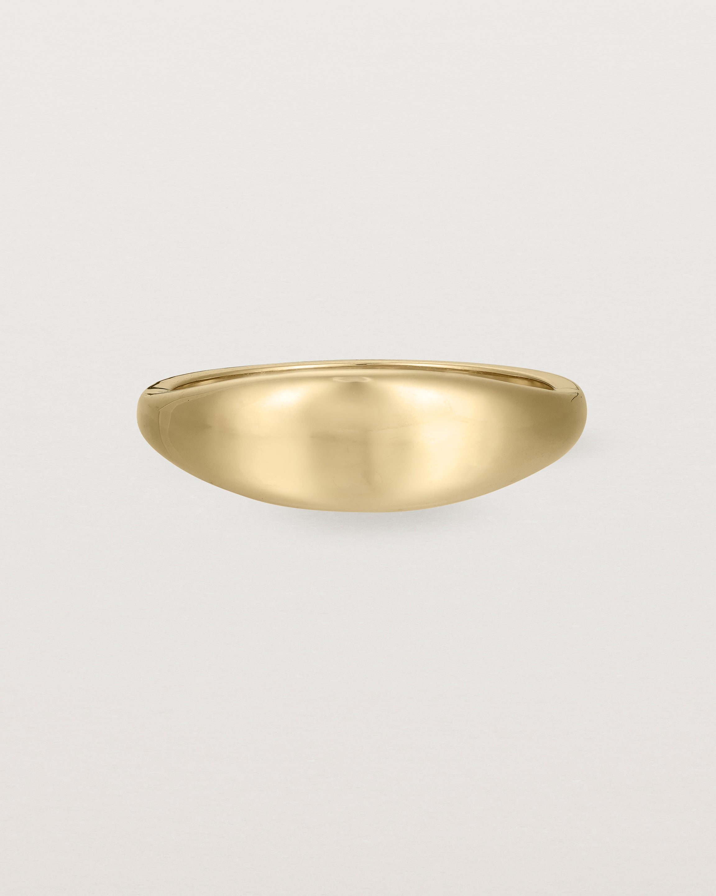 Front view of the Seule Ring in Yellow Gold.