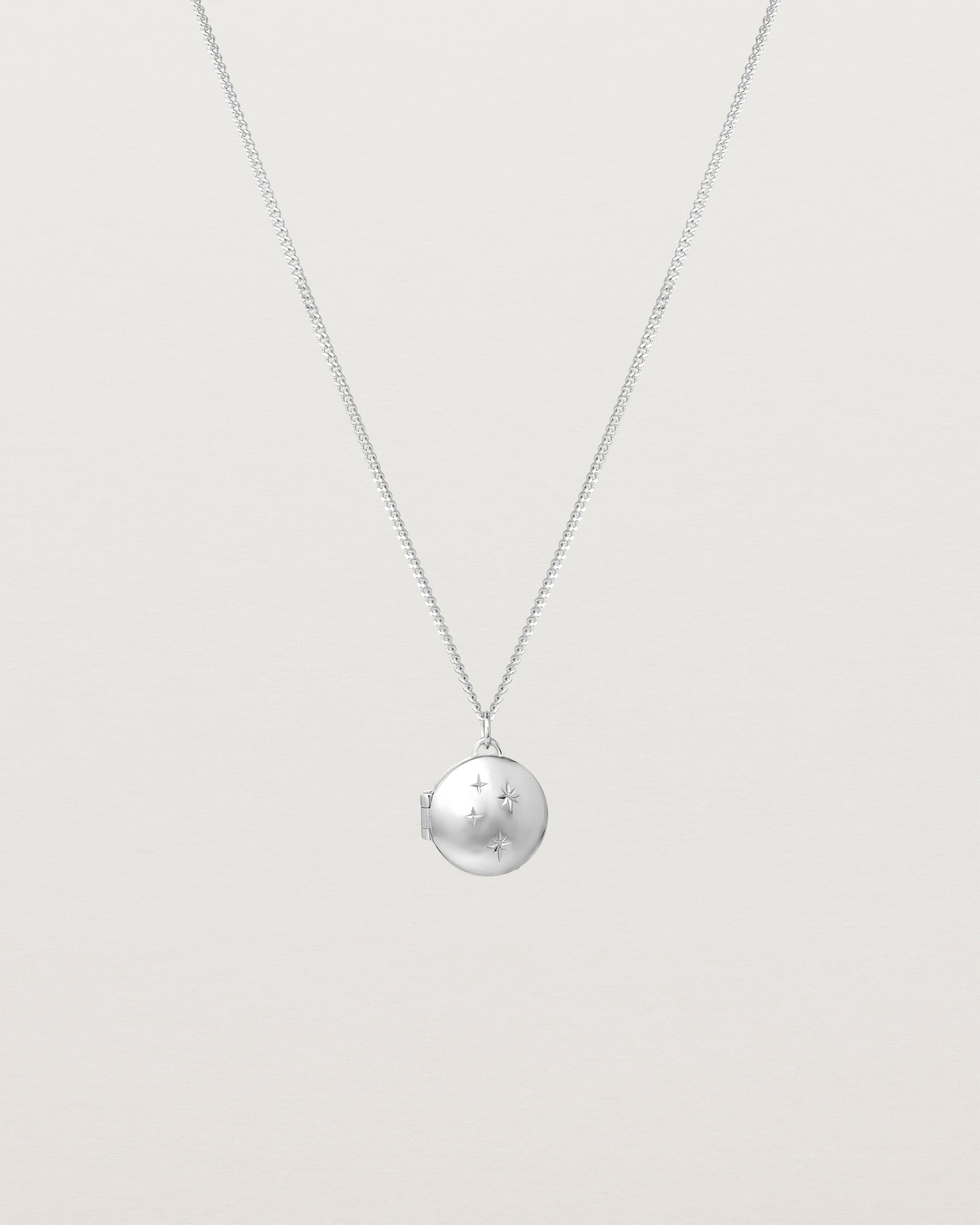 Front image of the starburst locket in sterling silver