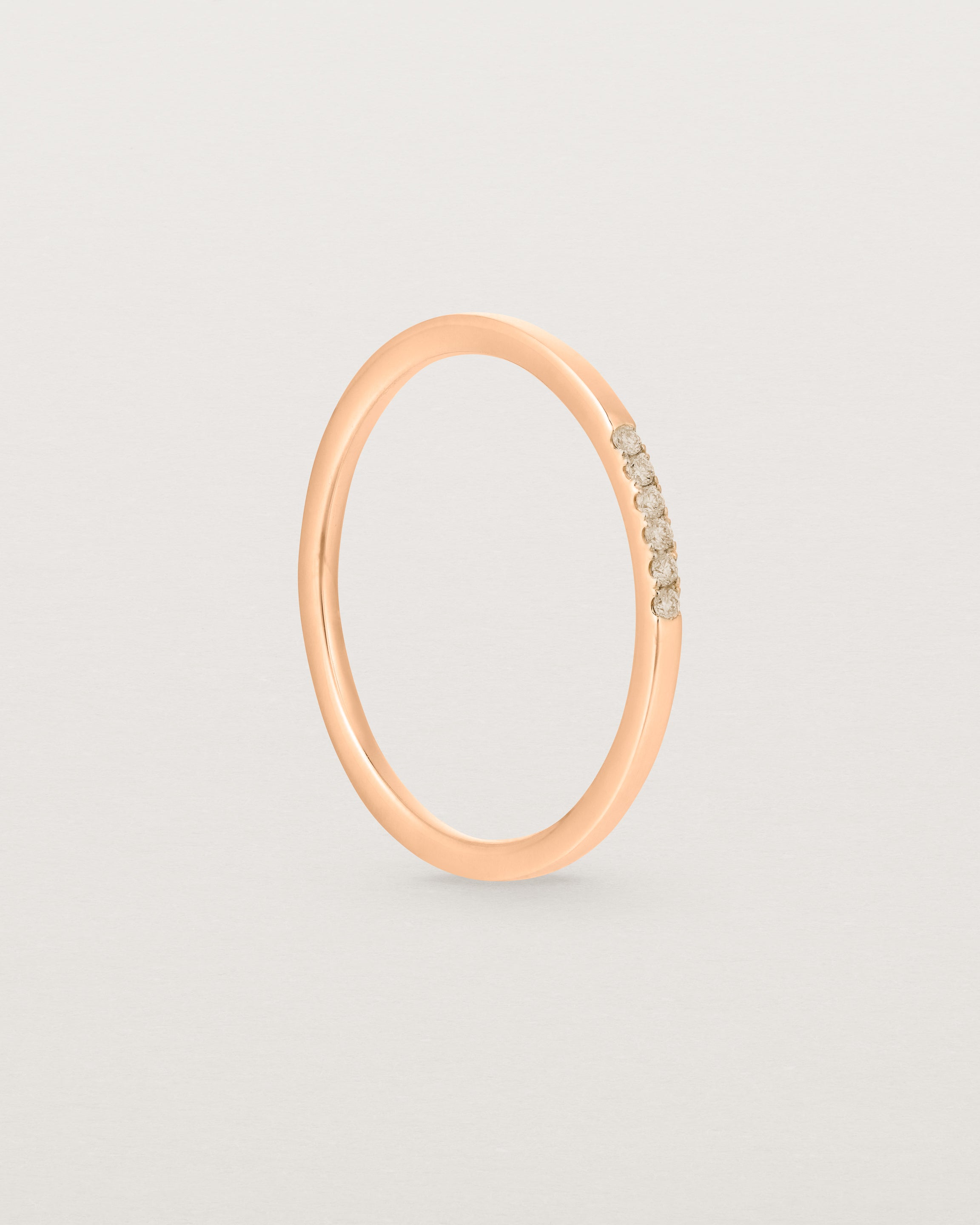Standing view of the Six Stone Queenie Ring | Champagne Diamonds | Rose Gold.