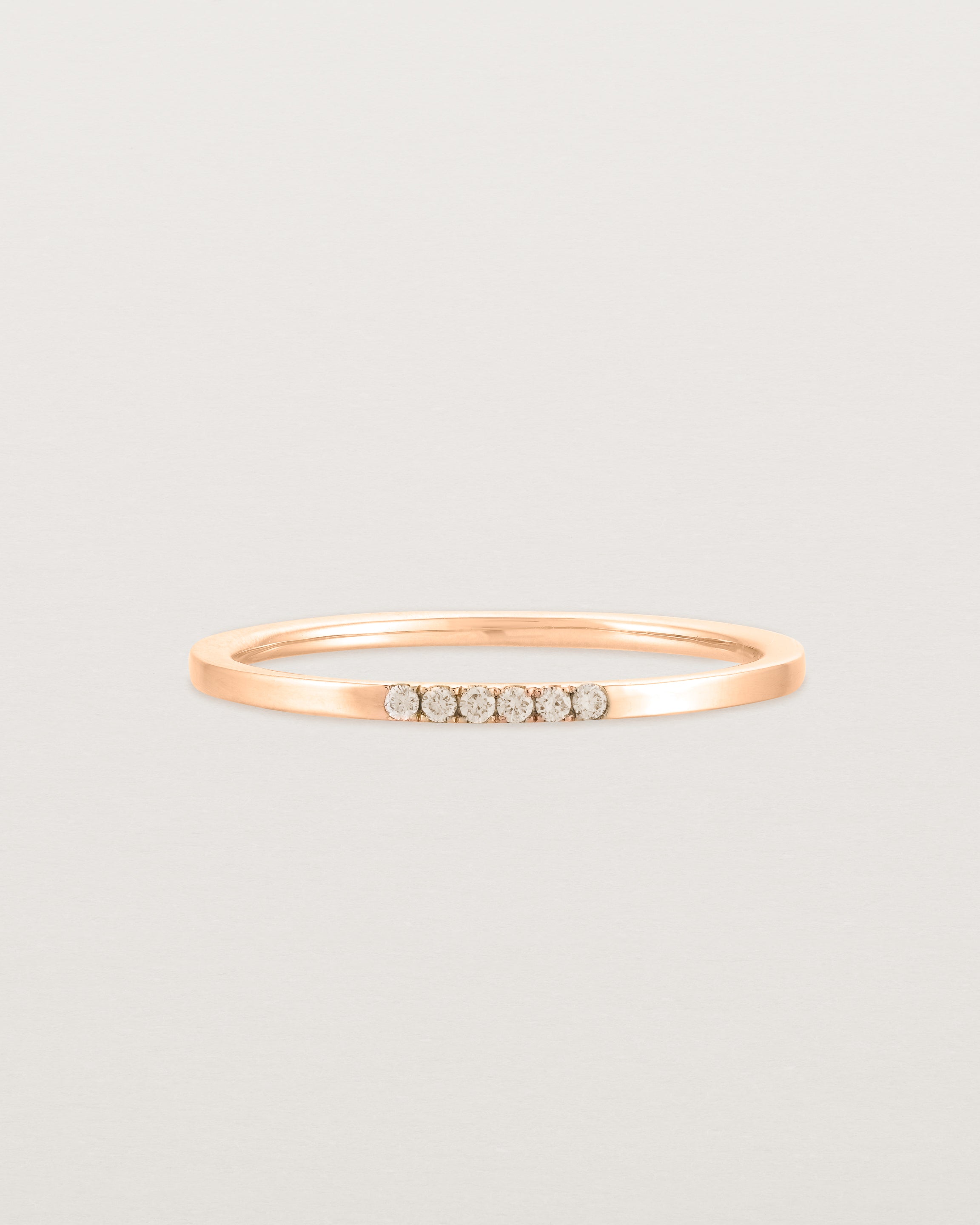 Front view of the Six Stone Queenie Ring | Champagne Diamonds | Rose Gold.