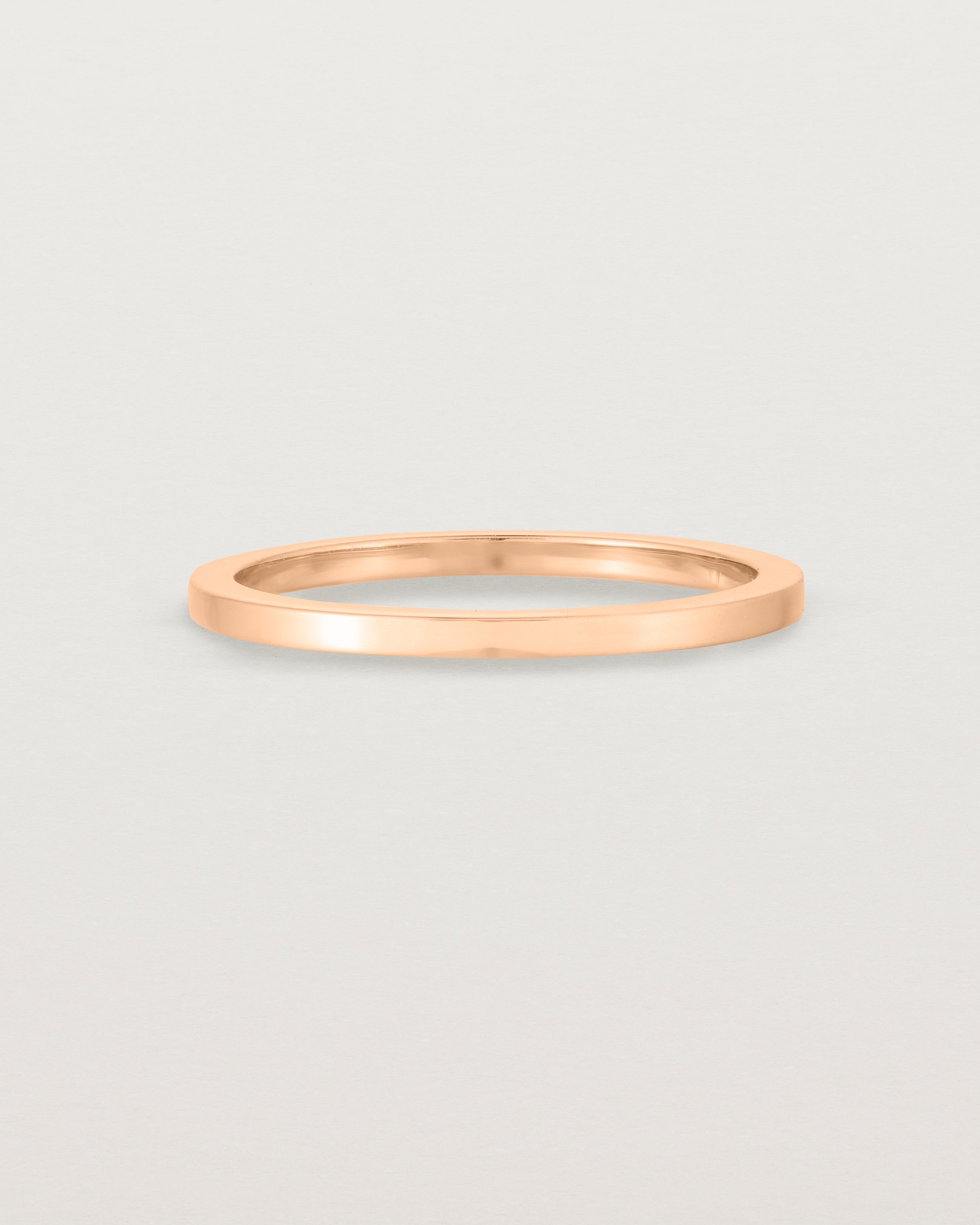 Our 1.5mm square wedding band in rose gold