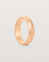 Standing view of the Surge Wedding Ring | 5mm | Rose Gold.