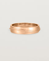 Front view of the Surge Wedding Ring | 5mm | Rose Gold.