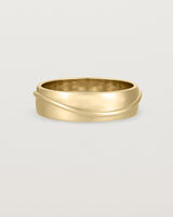 Front view of the Surge Wedding Ring | 6mm | Yellow Gold.
