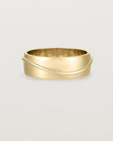 Front view of the Surge Wedding Ring | 7mm | Yellow Gold.