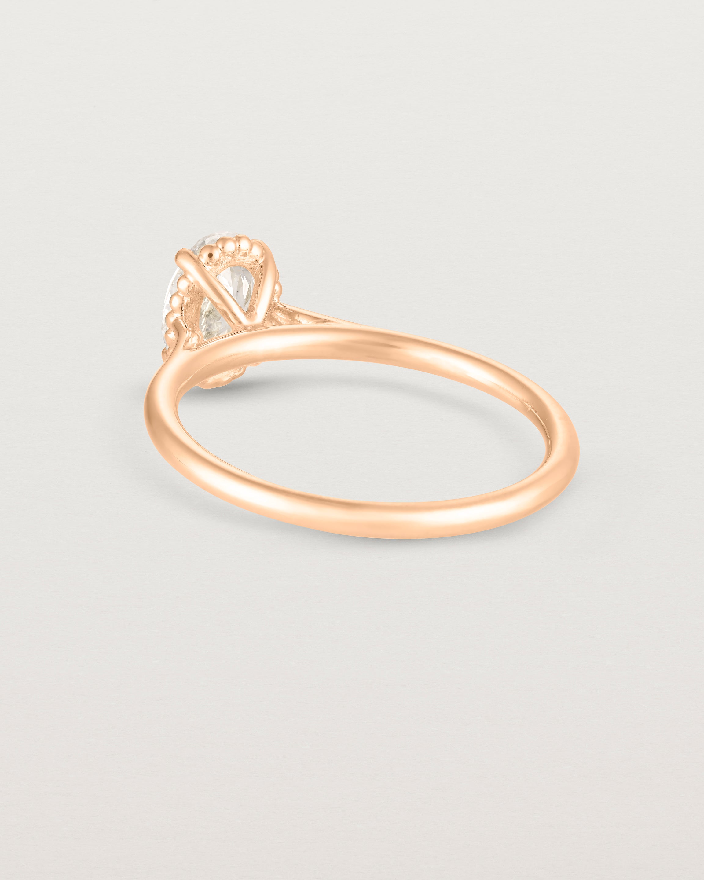 A back view of the Thea Oval Solitaire with a white Laboratory Grown Diamond in Rose Gold