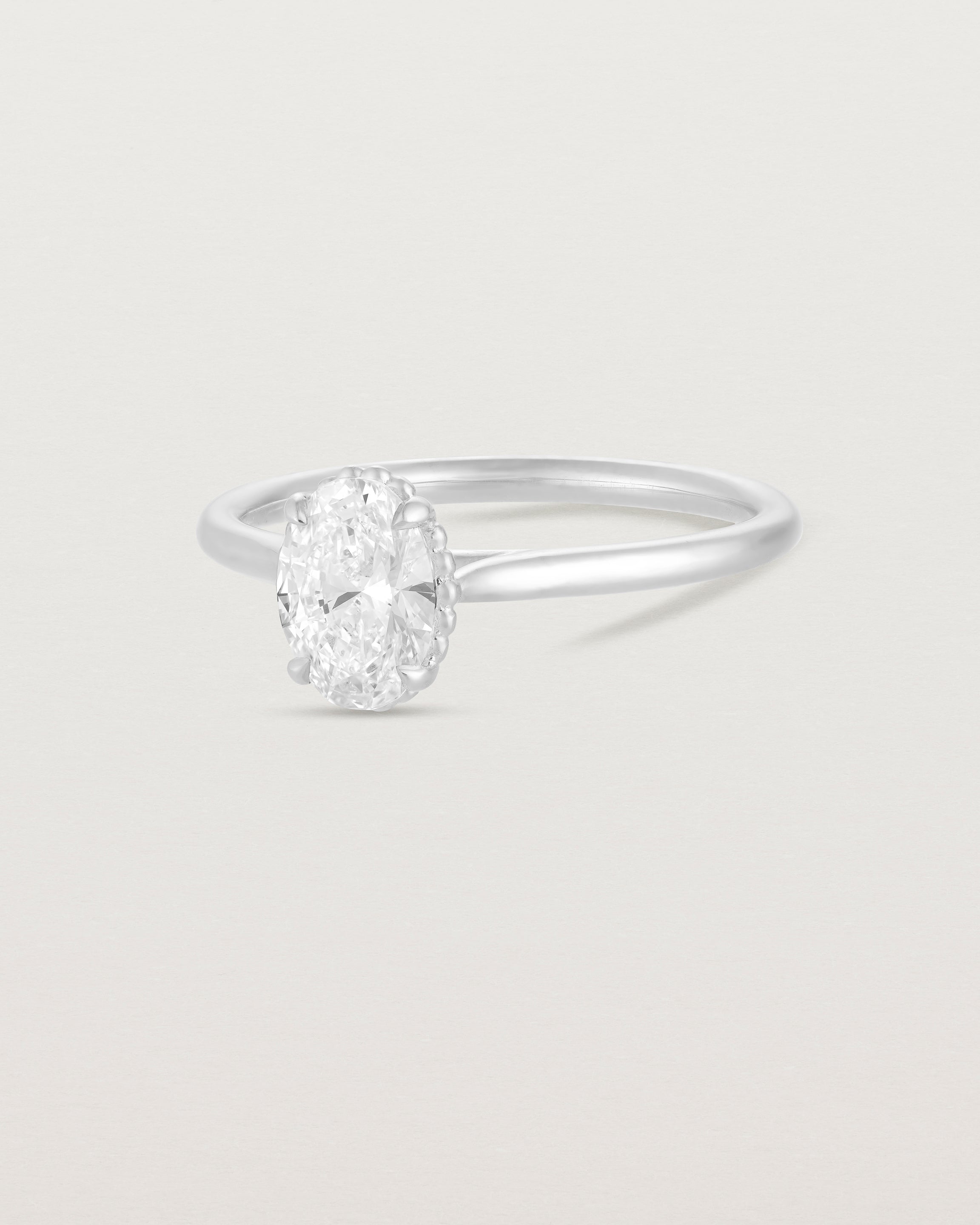 A side view of the Thea Oval Solitaire with a white Laboratory Grown Diamond in White Gold