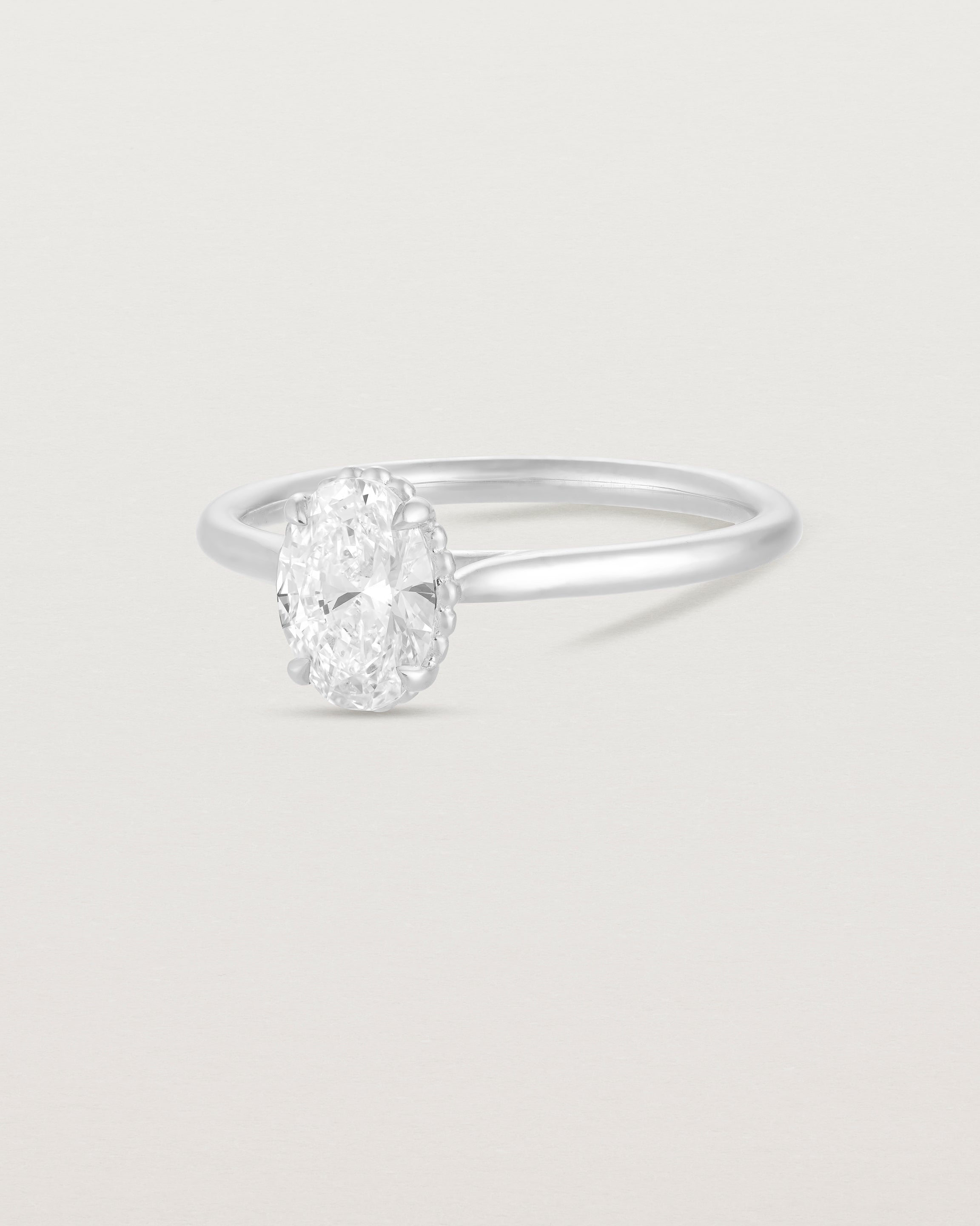 A side view of the Thea Oval Solitaire with a white Laboratory Grown Diamond in White Gold