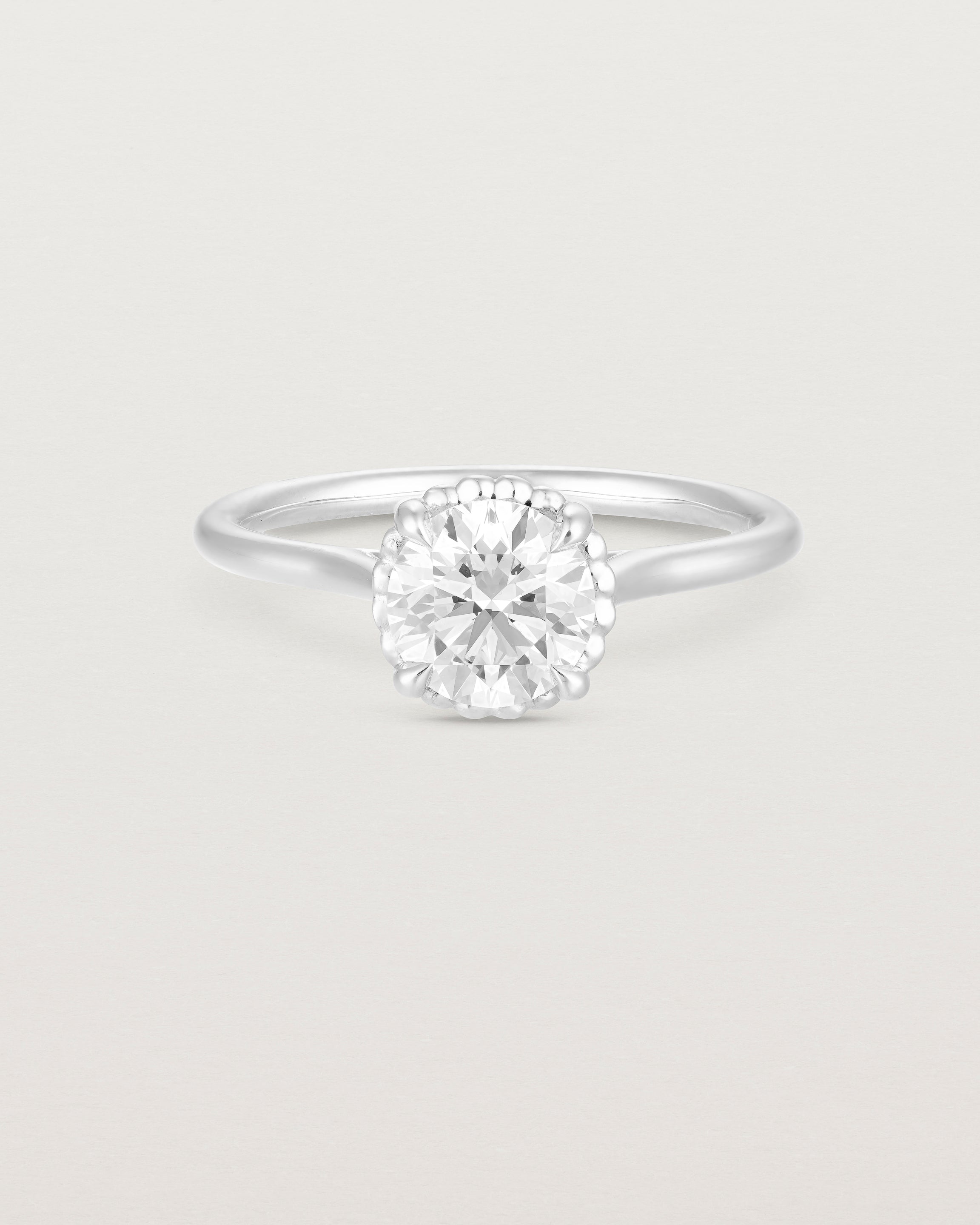 A front view of the Thea Round Solitaire with a white Laboratory Grown Diamond in White Gold