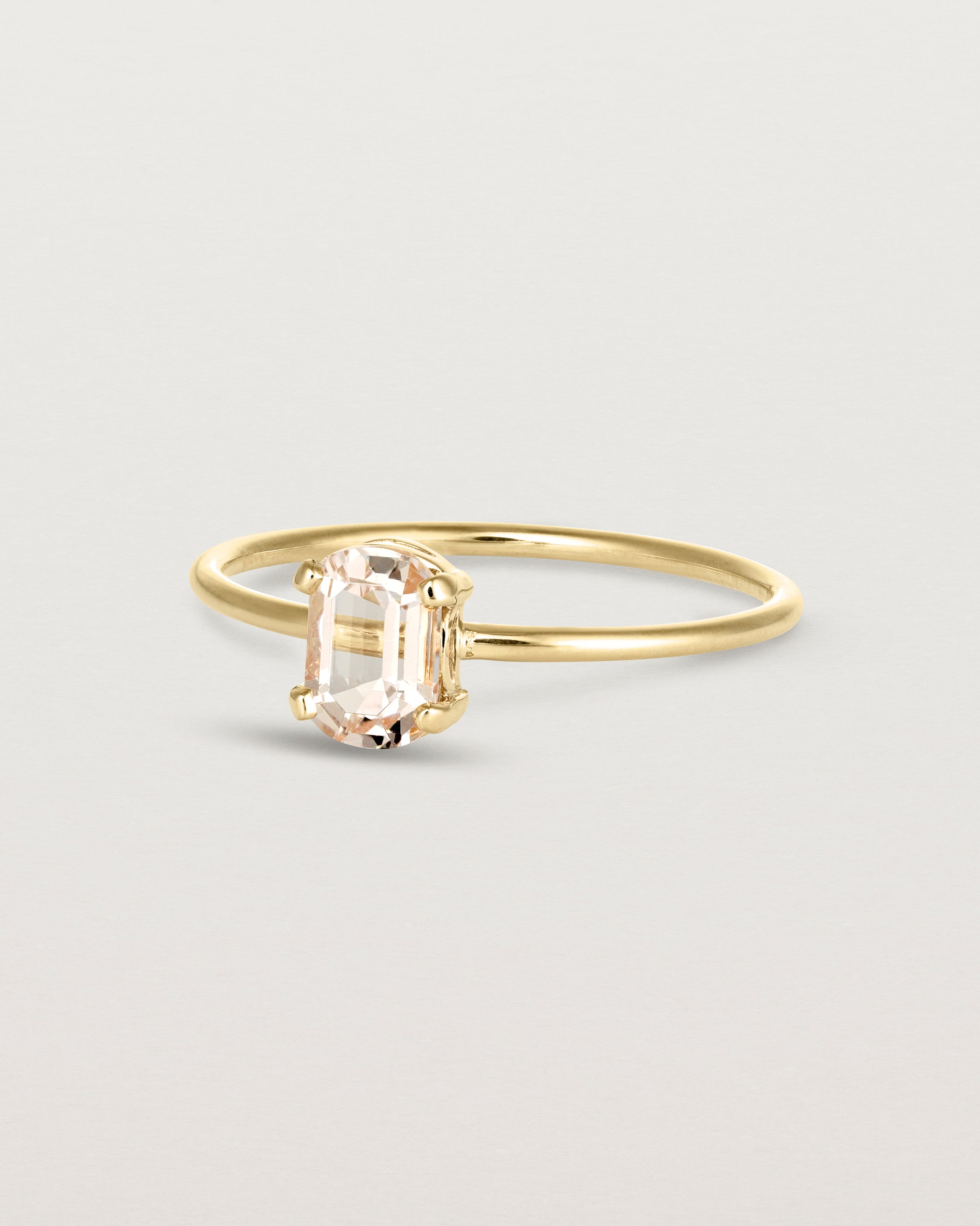 Angled view of the Tiny Fei Ring | Morganite in yellow gold.