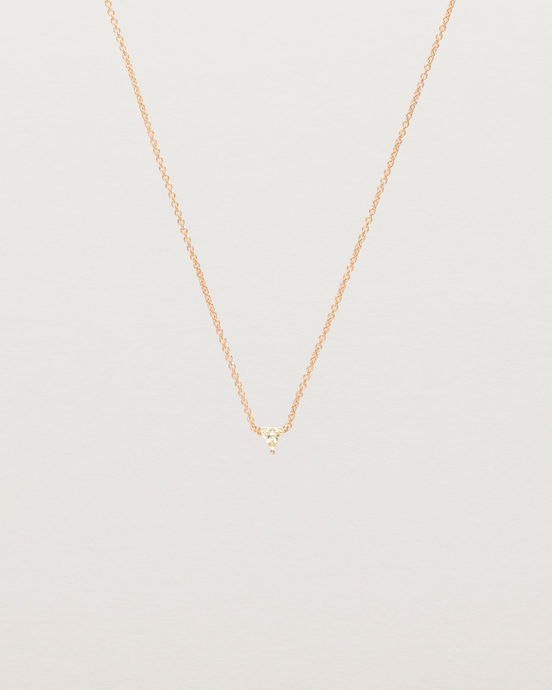Front view of the Tiny Trillion Necklace with Heliodor in Rose Gold.