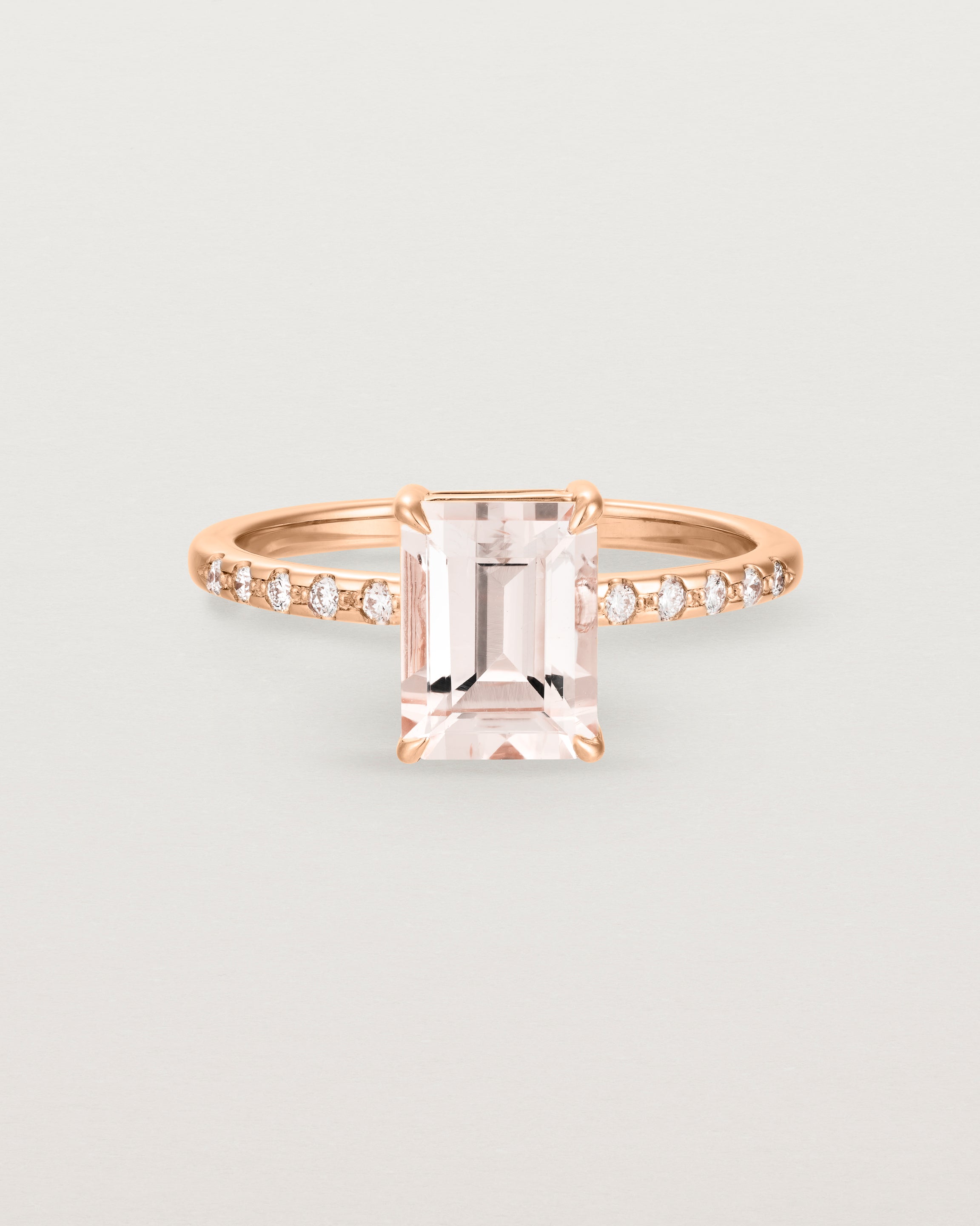 Front view of the Una Emerald Solitaire | Morganite | Rose Gold with Cascade Shoulders.