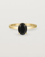 Front view of the Una Oval Solitaire | Black Spinel | Yellow Gold.
