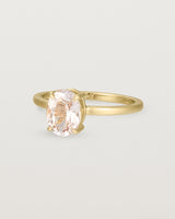 Angled view of the Una Oval Solitaire | Morganite | Yellow Gold.