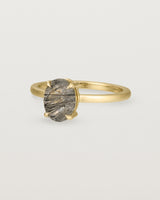 Angled view of the Una Oval Solitaire | Tourmalinated Quartz | Yellow Gold.