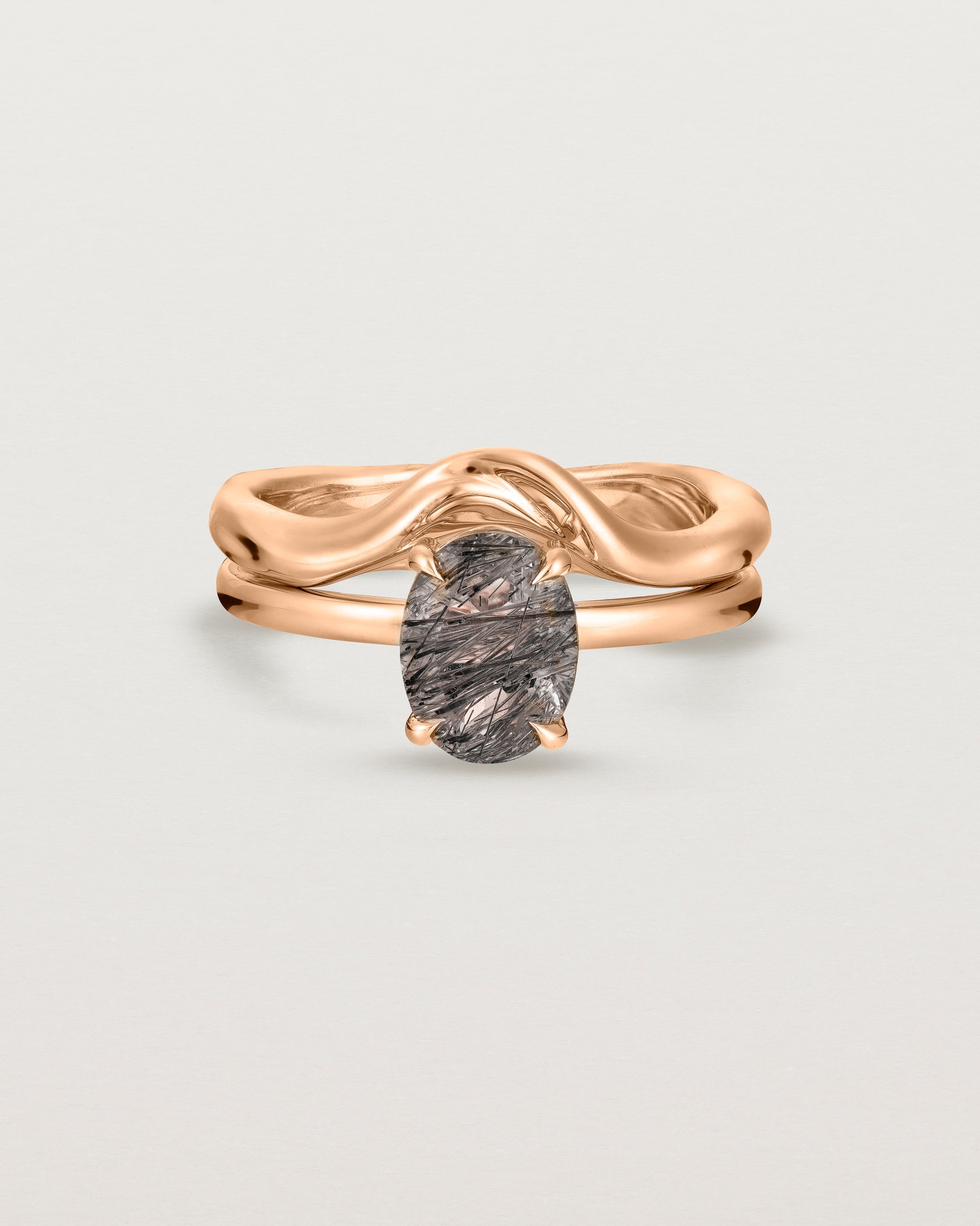 Front view of the Una Oval Solitaire | Tourmalinated Quartz | Rose Gold stacked with the Organic Crown Ring.