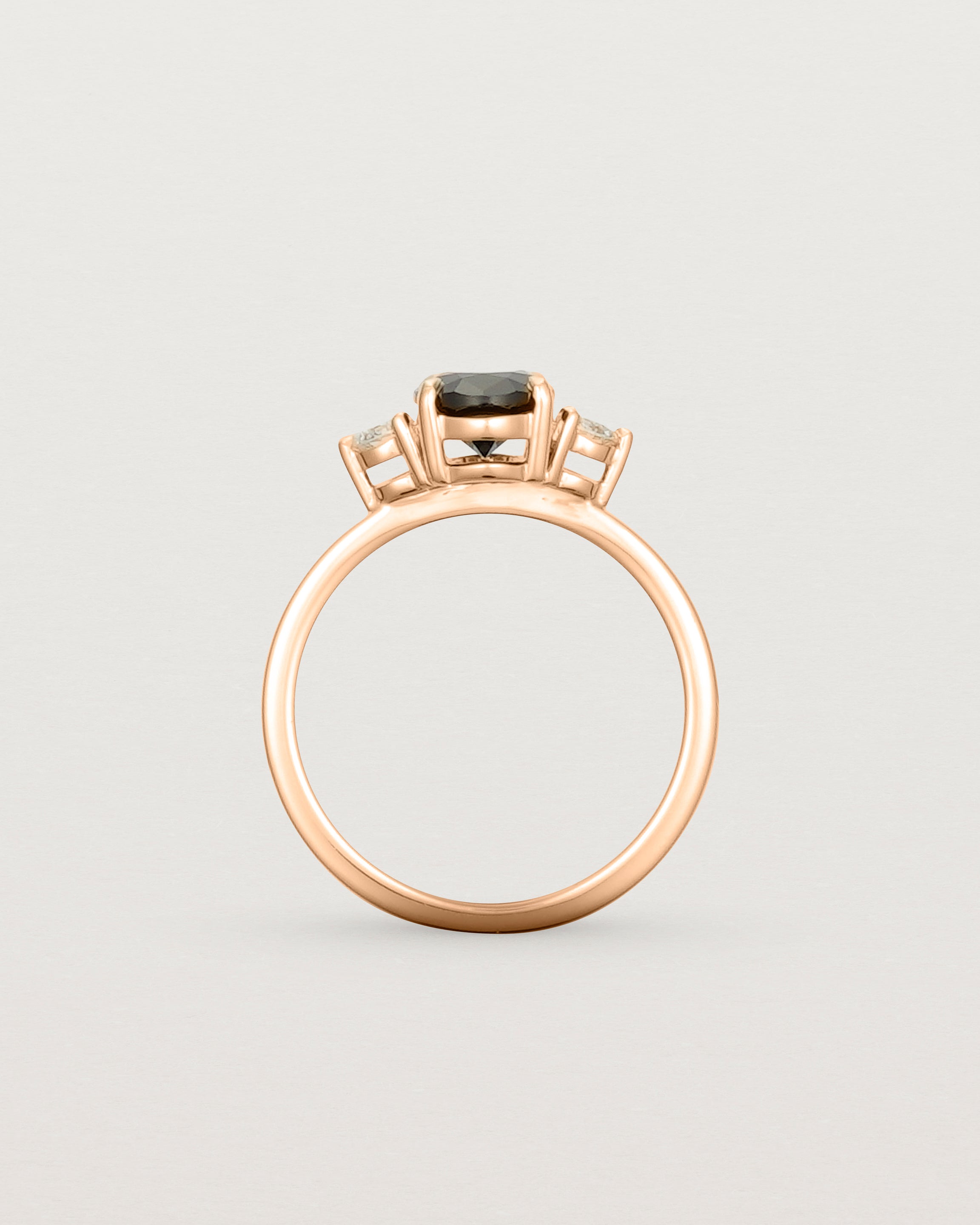 Standing view of the Una Oval Trio Ring | Black Spinel & Diamonds | Rose Gold.