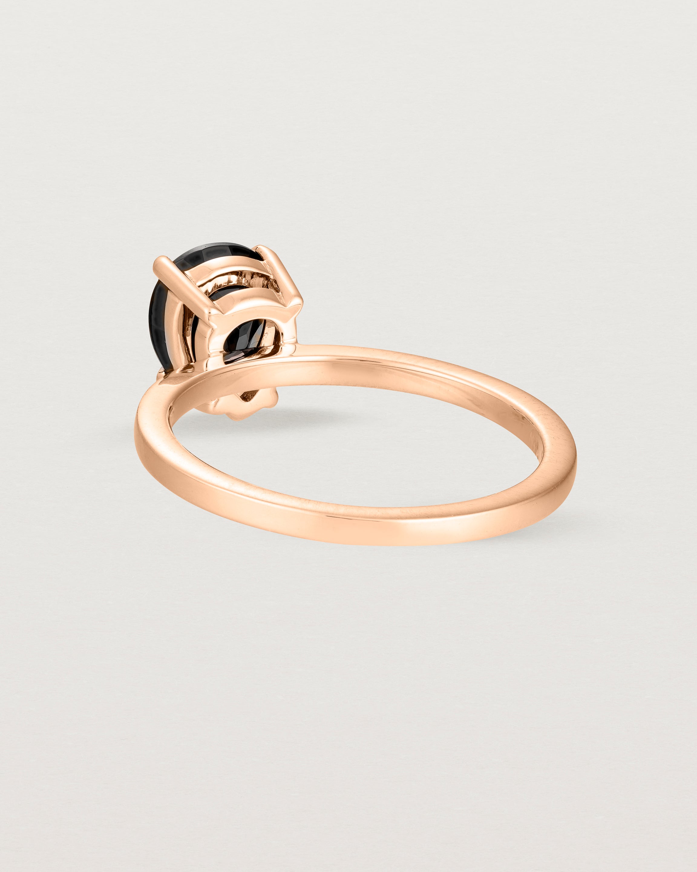 Back view of the Una Pear Solitaire | Black Spinel | Rose Gold.