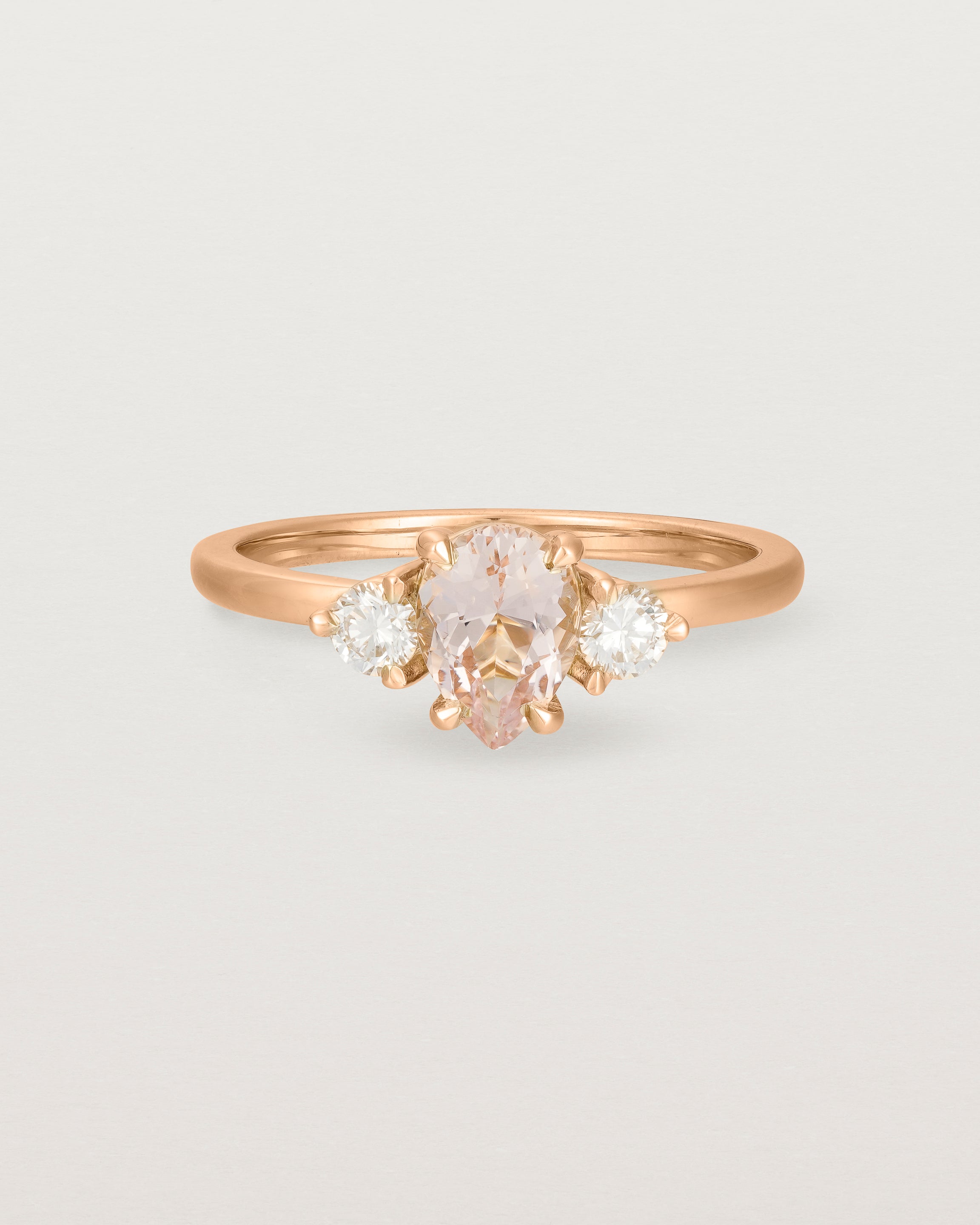 Front view of the Una Pear Trio Ring | Morganite & Diamonds | Rose Gold.