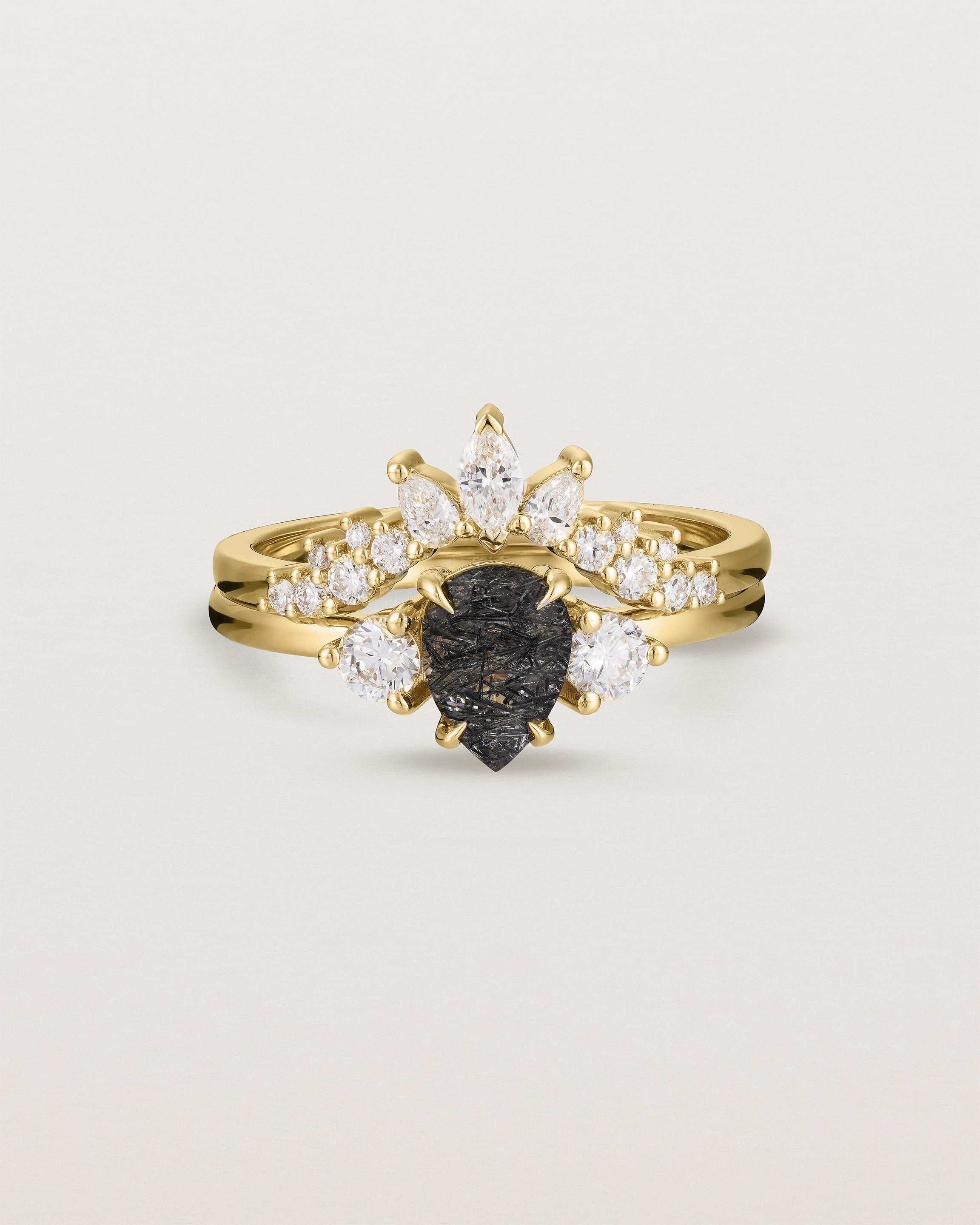 Front view of the Una Pear Trio Ring | Tourmalinated Quartz & Diamonds | Yellow Gold stacked with the Thalia Crown Ring | Diamonds. 