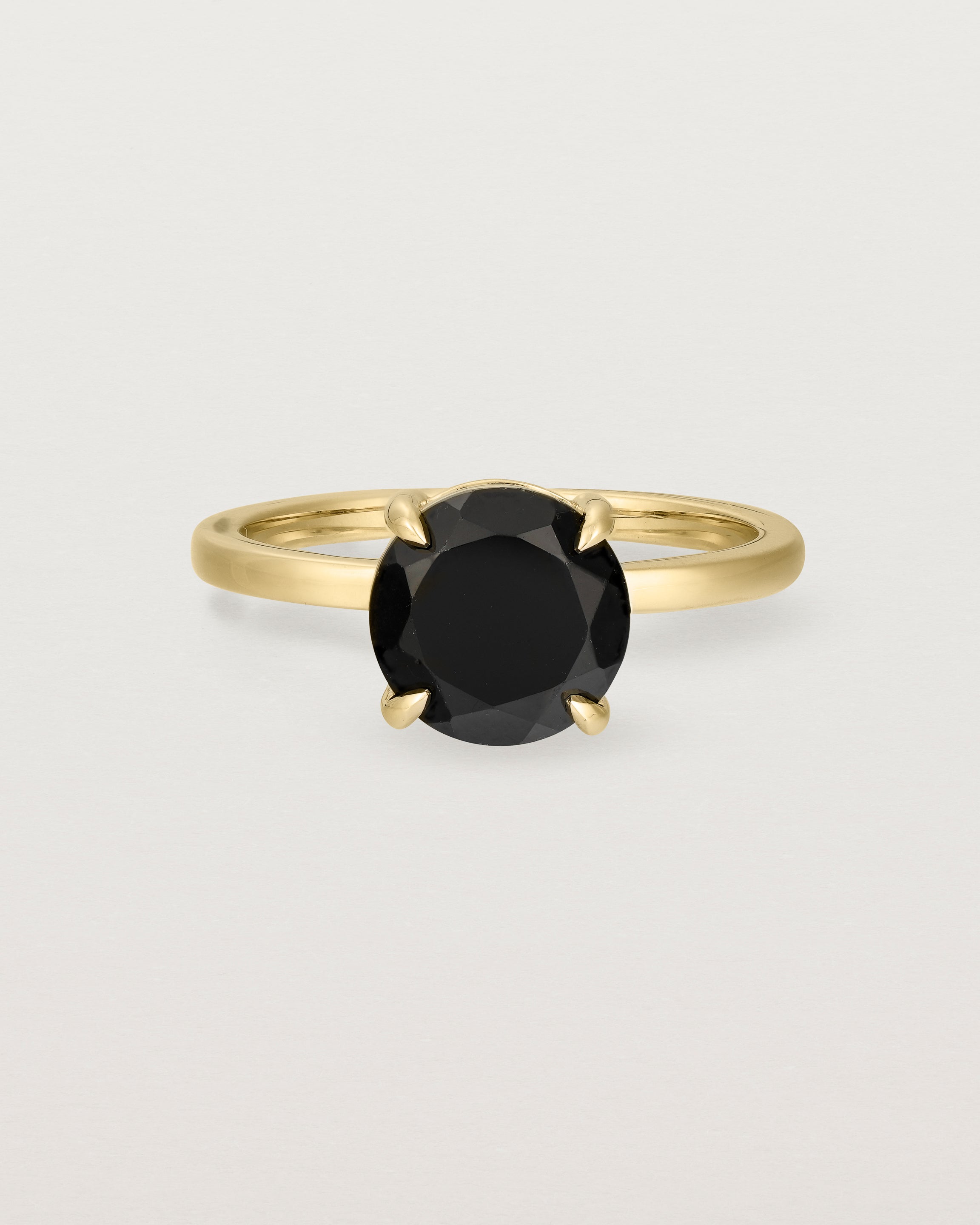 Front view of the Una Round Solitaire | Black Spinel | Yellow Gold