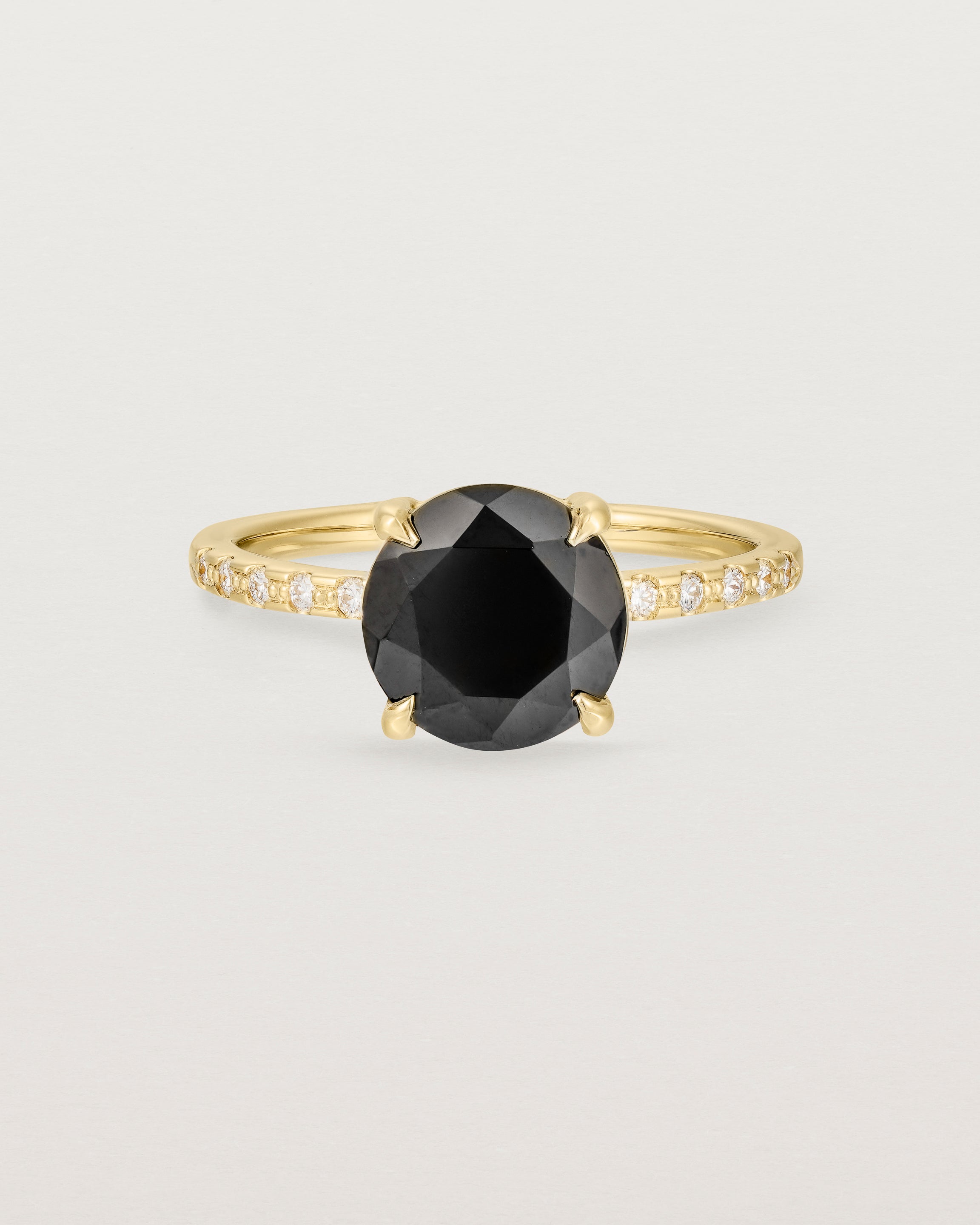 Front view of the Una Round Solitaire | Black Spinel | Yellow Gold with Cascade Shoulders